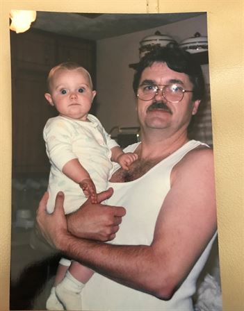 A man holding a baby