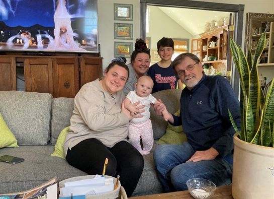 A group of people sitting on a couch