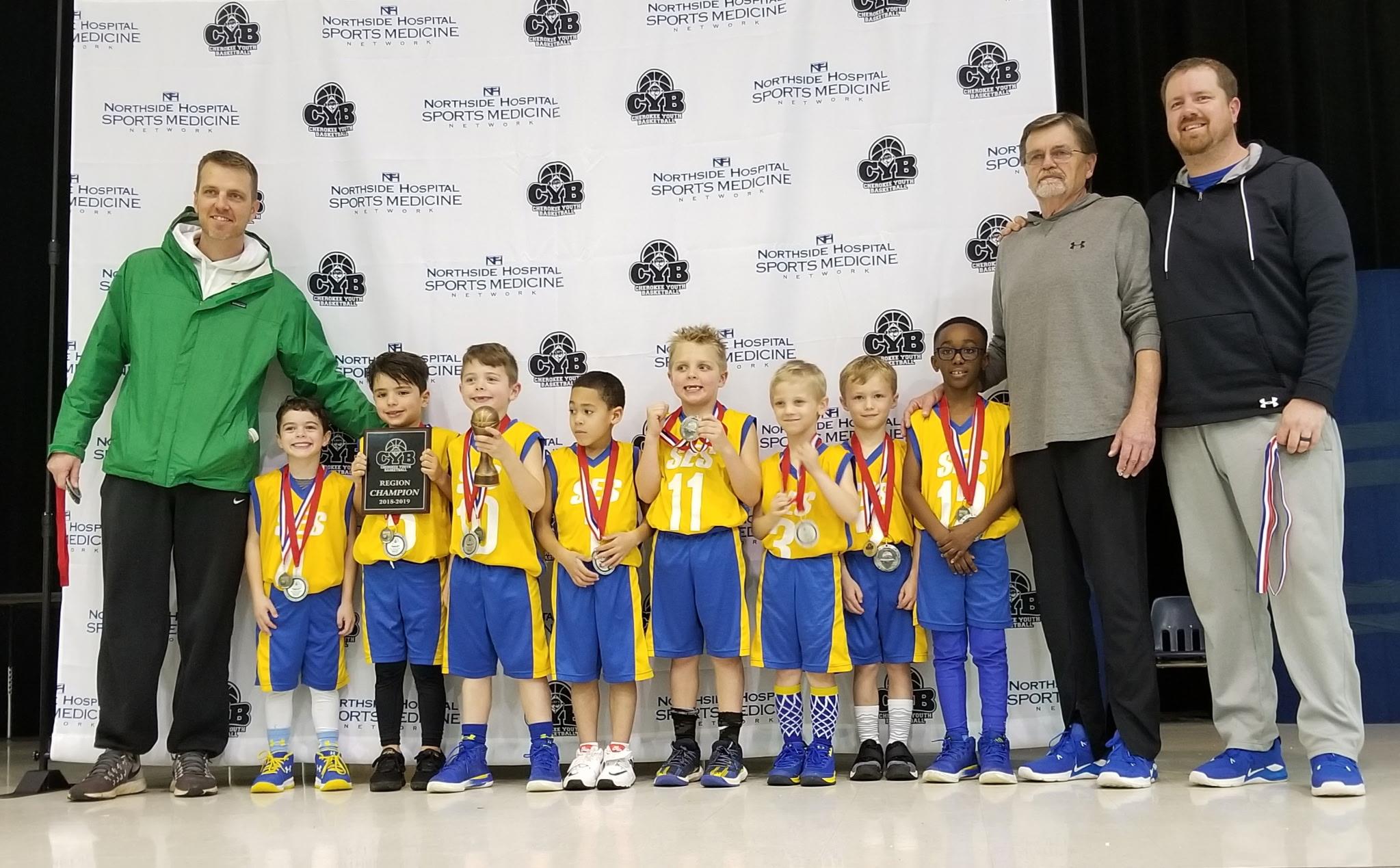 A group of kids posing for a photo