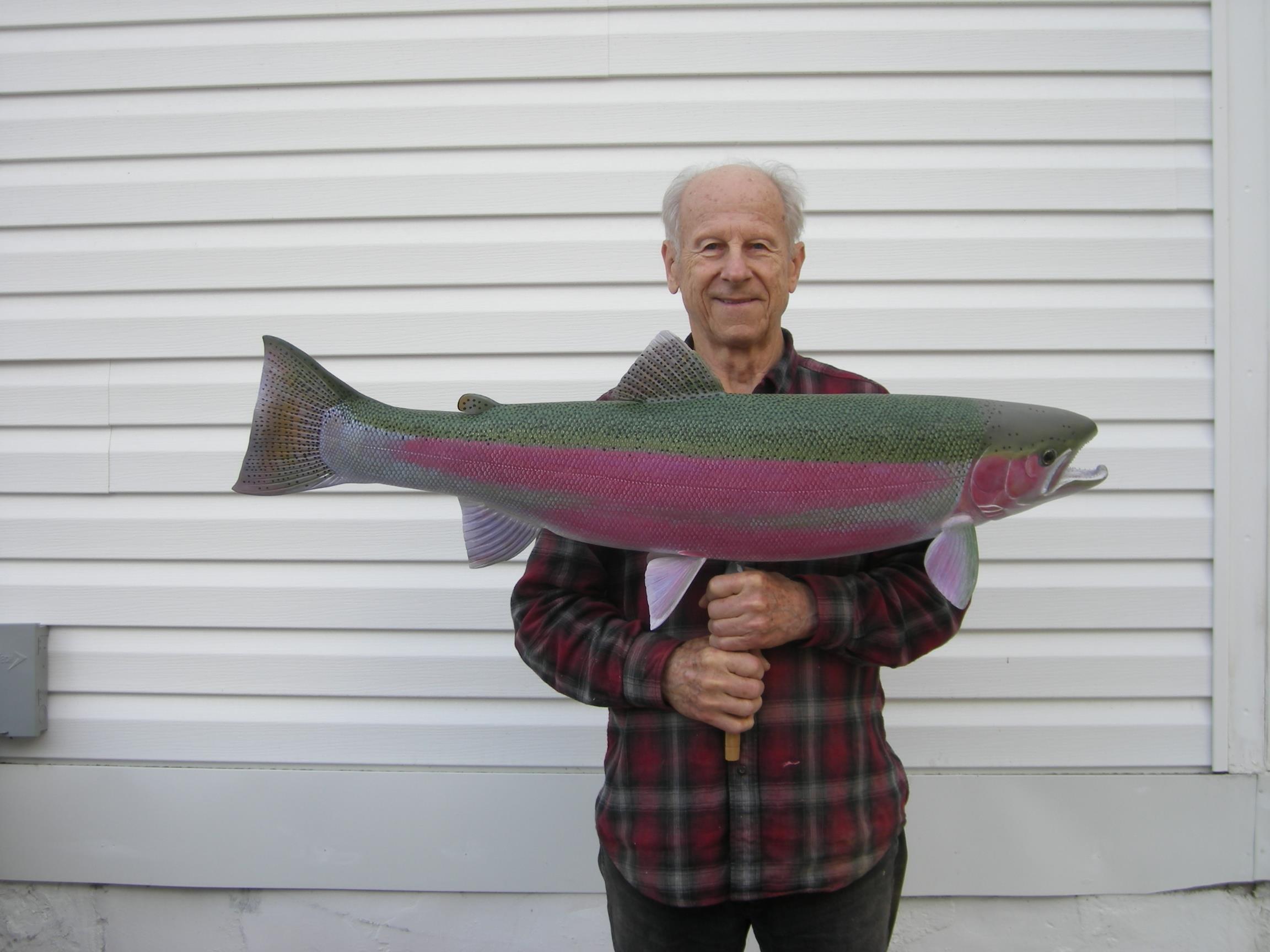 A man holding a large fish