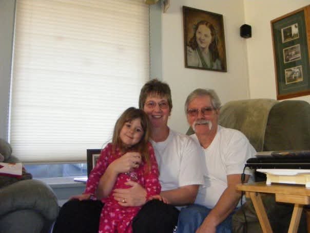 A man and woman sitting on a couch
