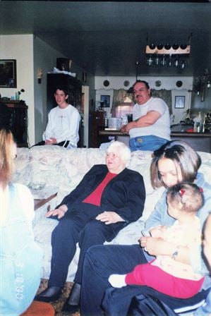 A group of people sitting on a couch