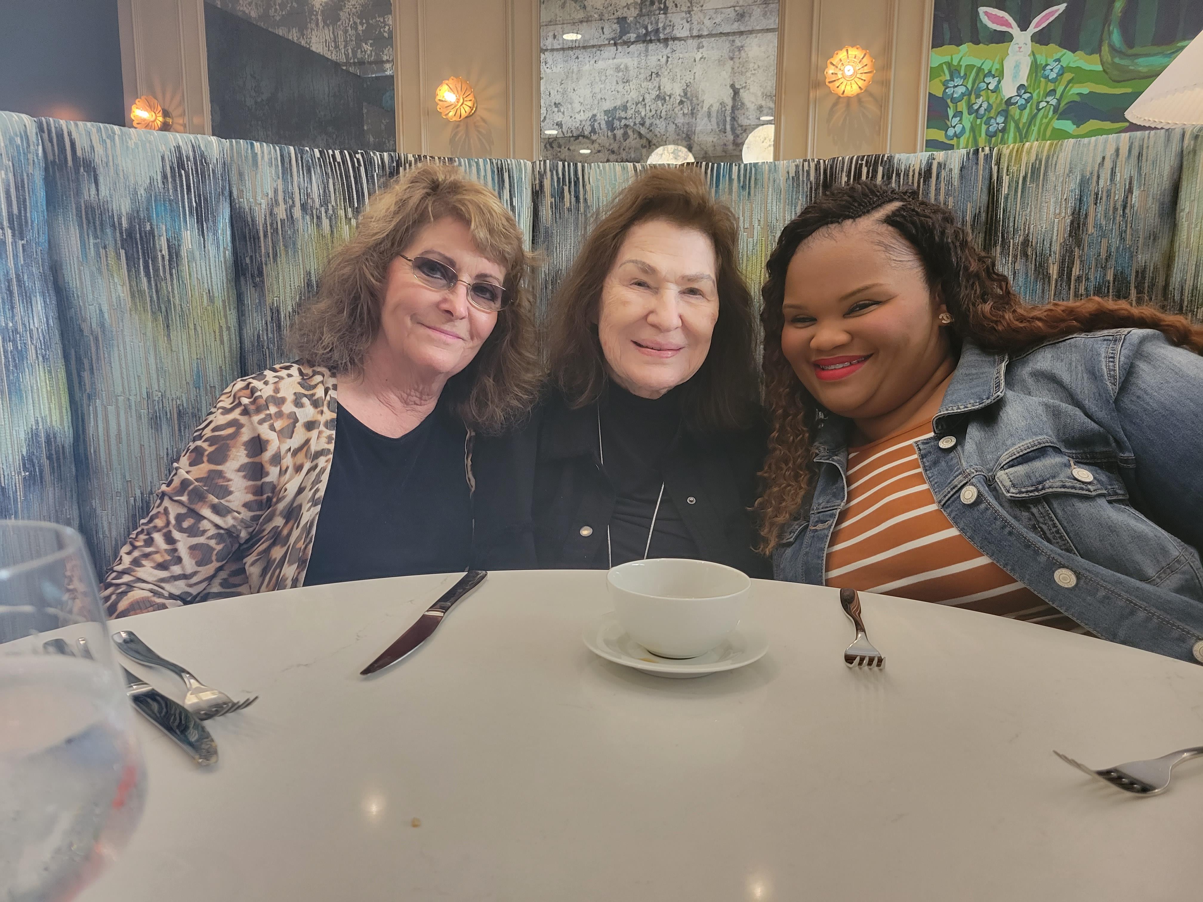 A group of women sitting at a table
