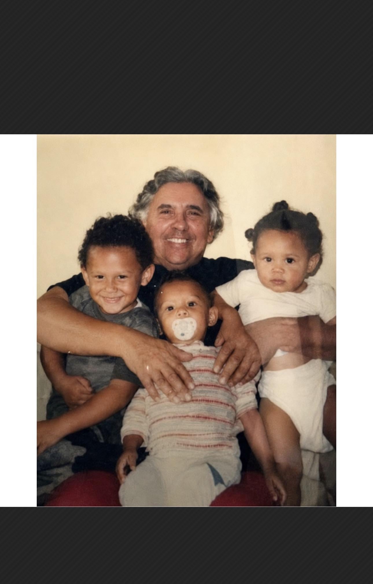 A man holding a group of children