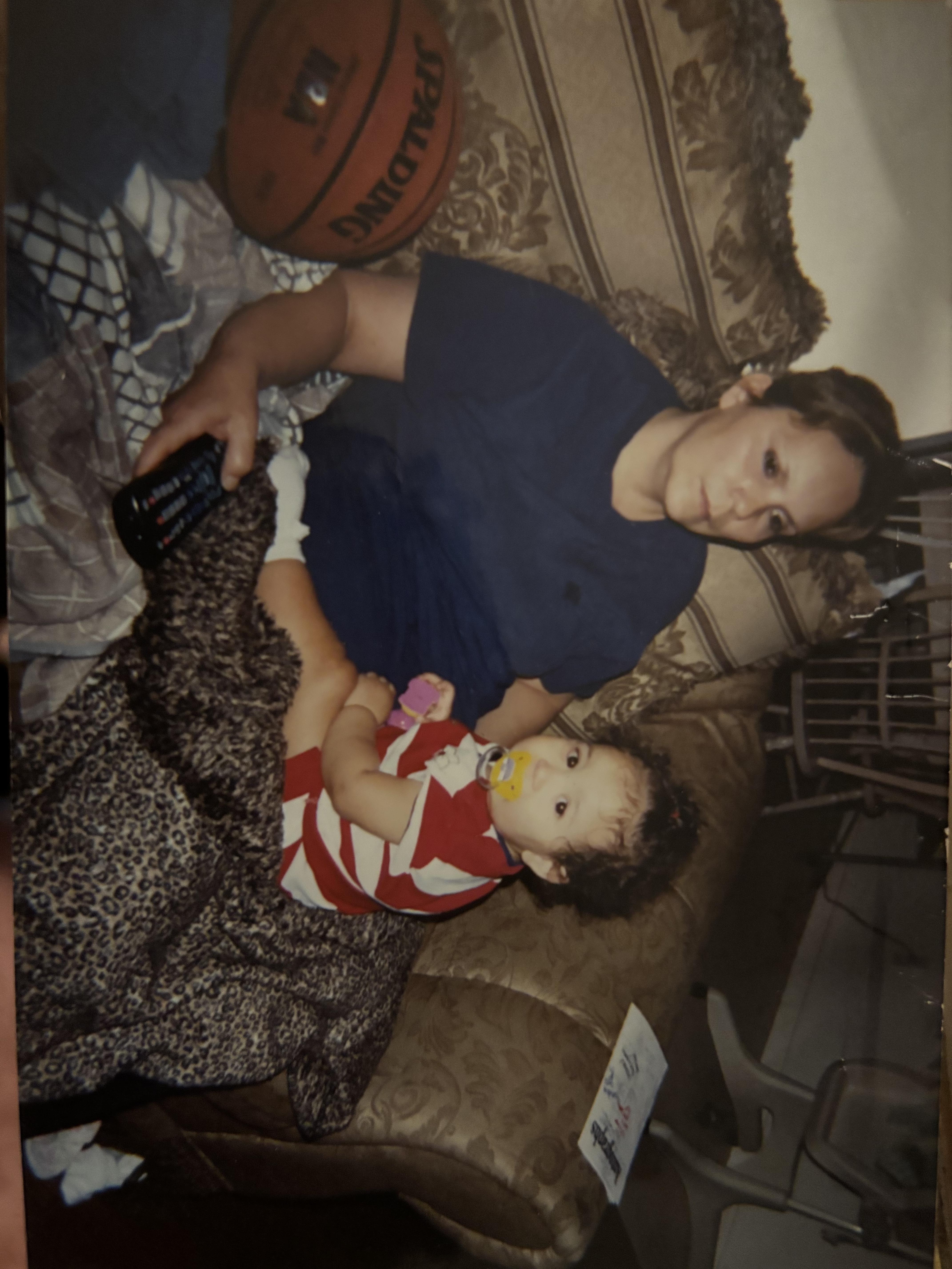 A woman holding a baby