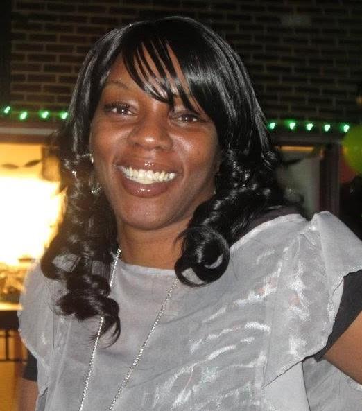 A woman smiling at the camera