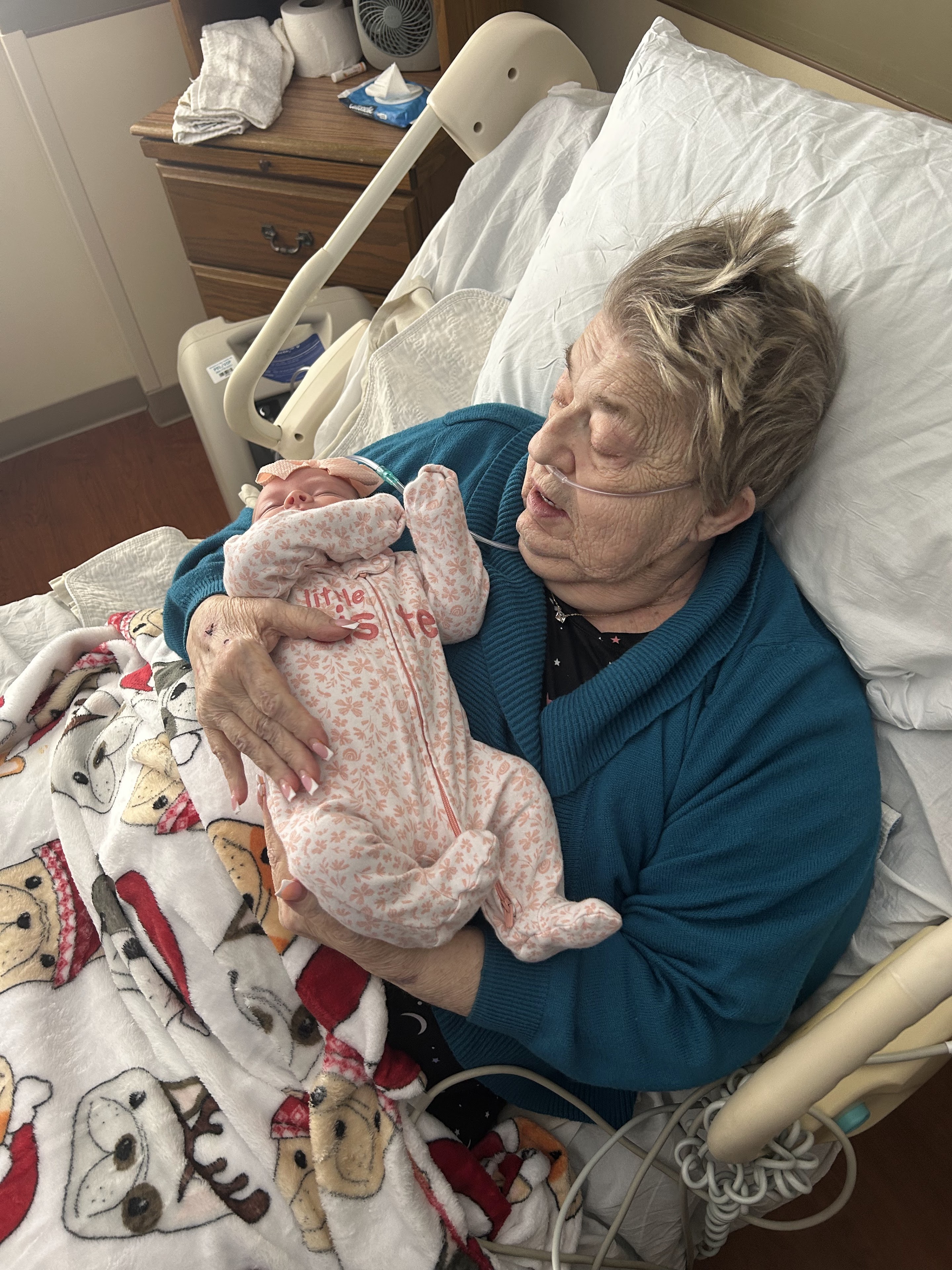 A woman holding a baby
