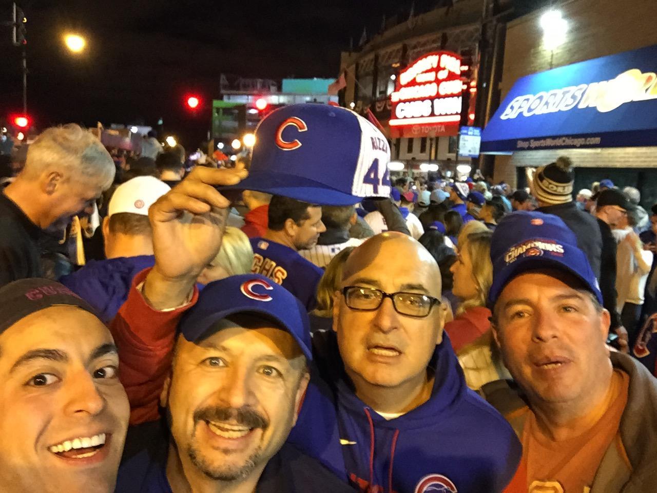 A group of men in baseball hats