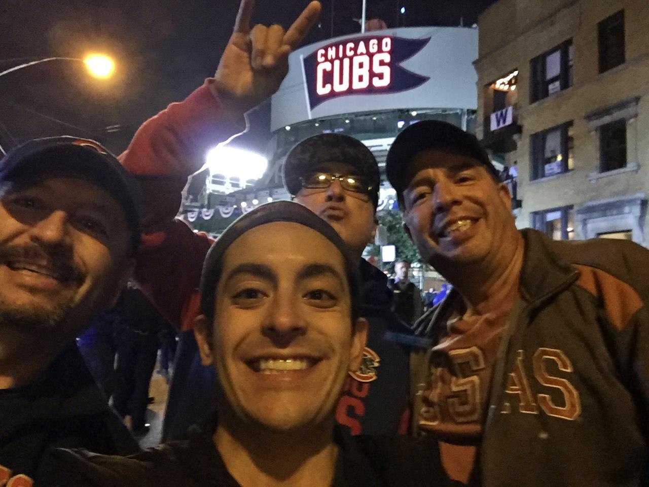 A group of men taking a selfie