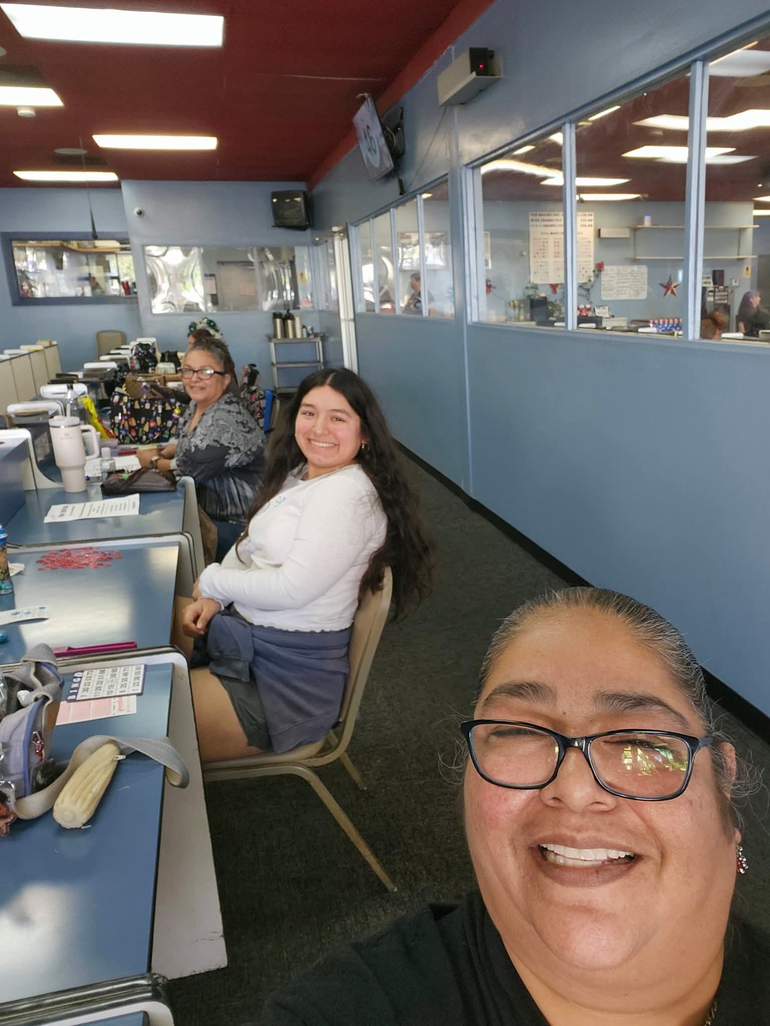 A group of women sitting at tables