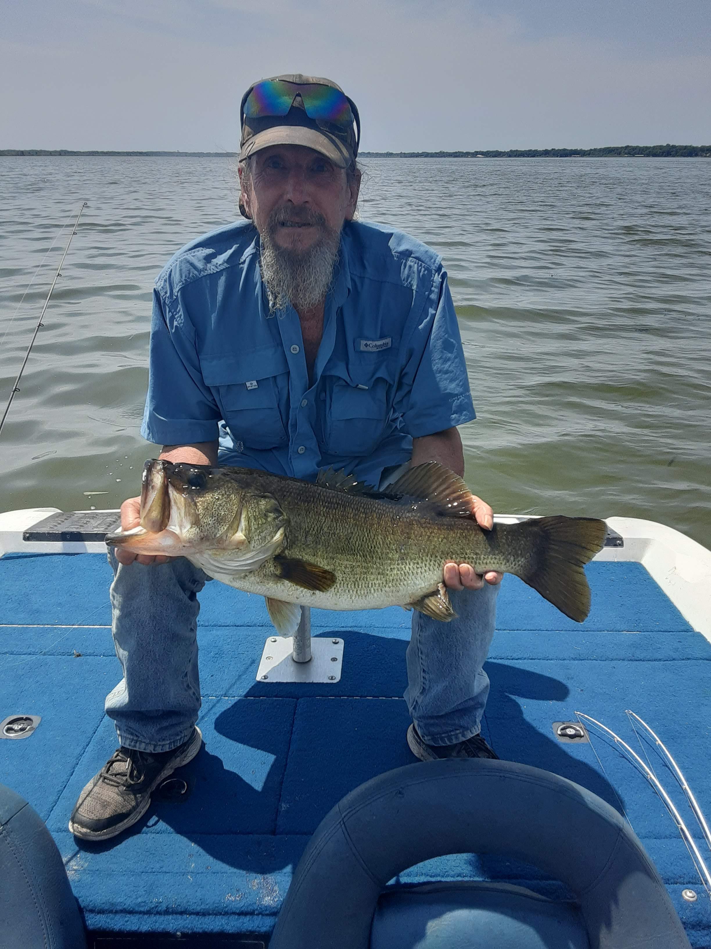 A man holding a large fish