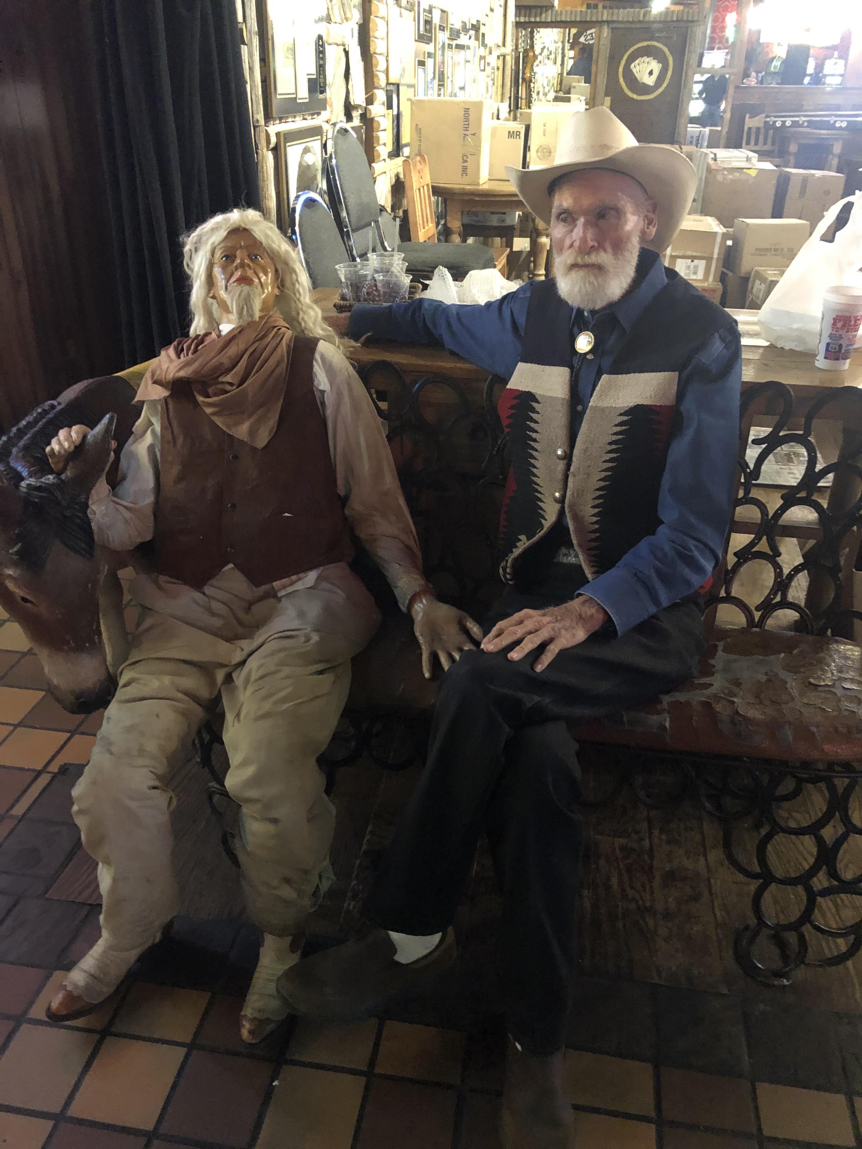 Two men sitting on a bench