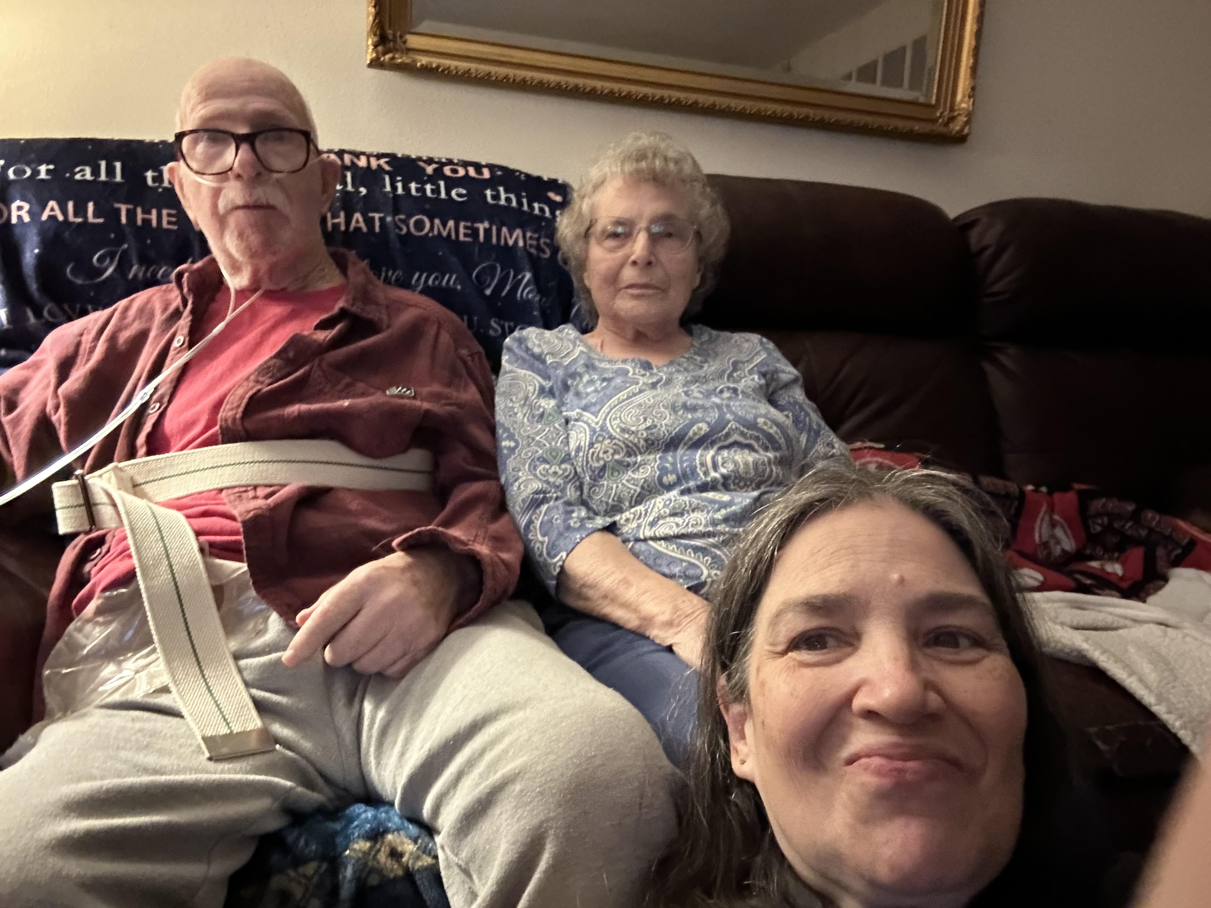 A group of people sitting on a couch