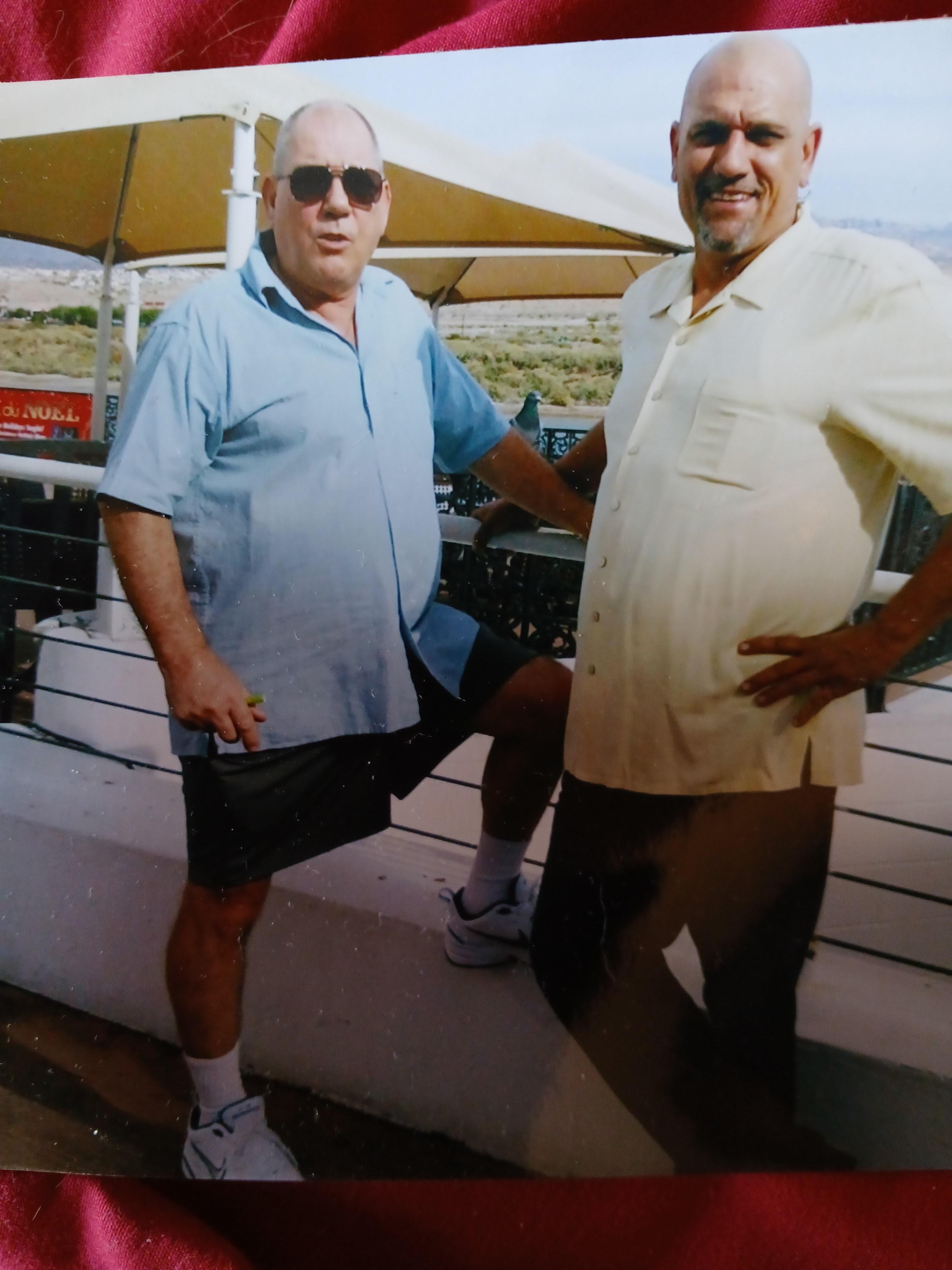 Two men standing next to each other