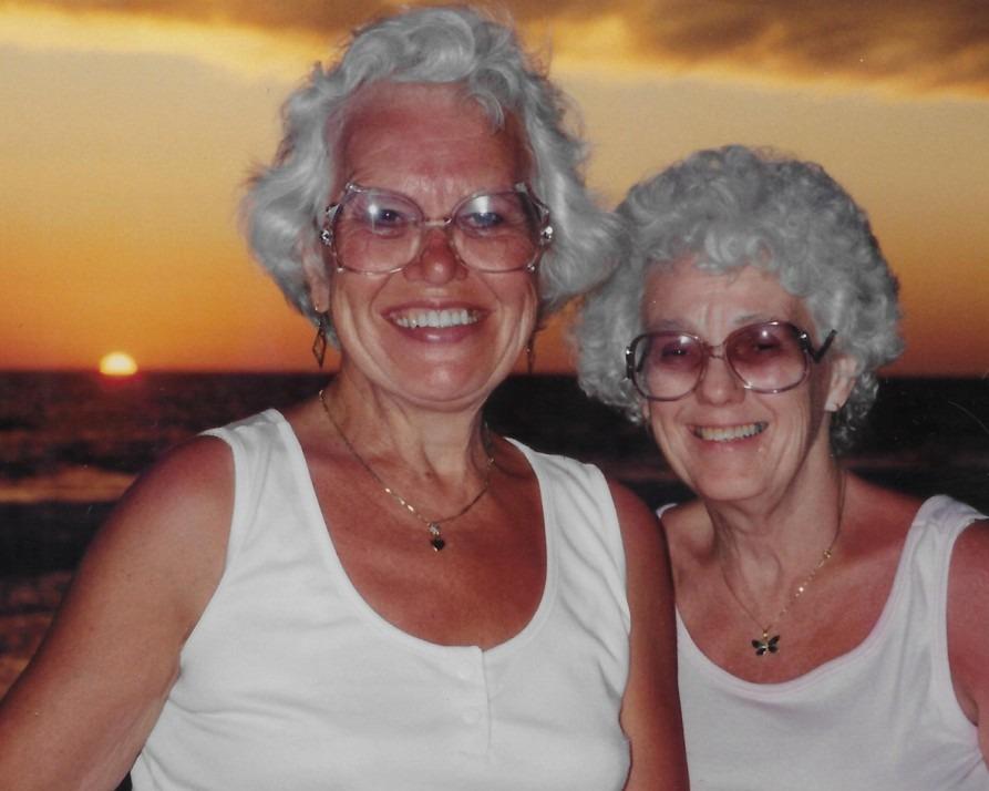 Two women smiling at the camera