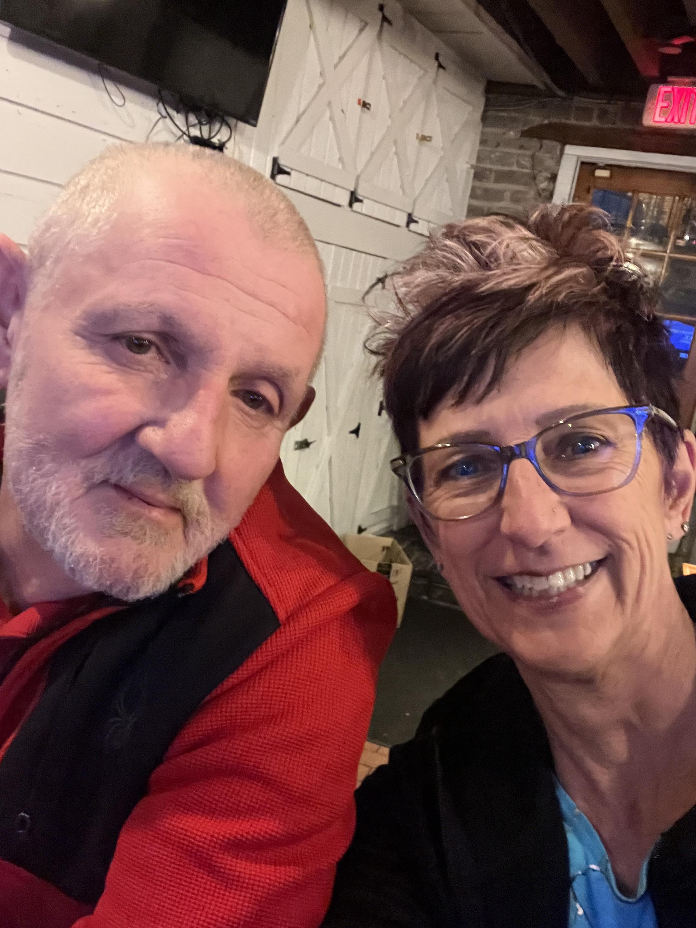 A man and woman taking a selfie