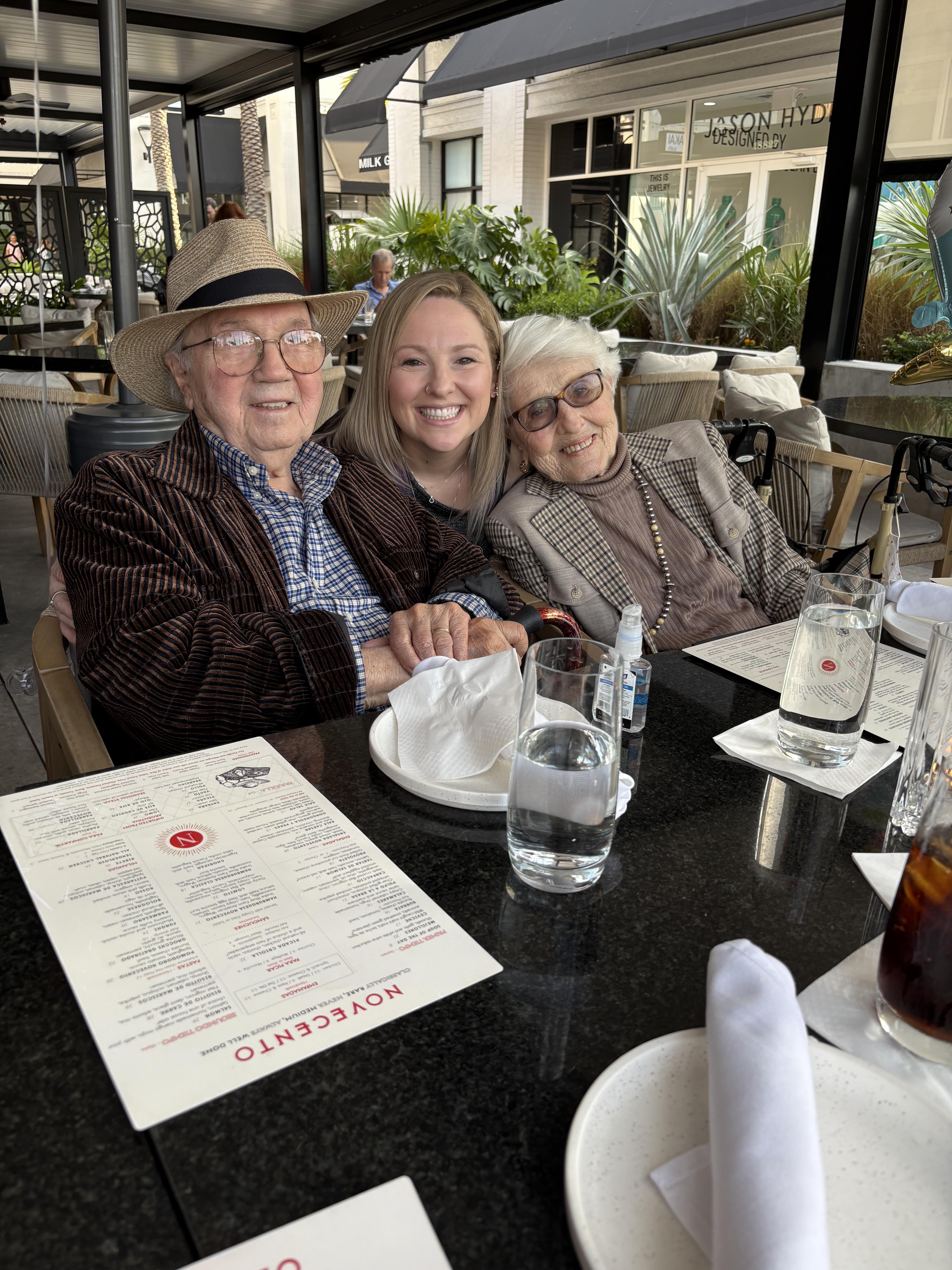 A group of people sitting at a table