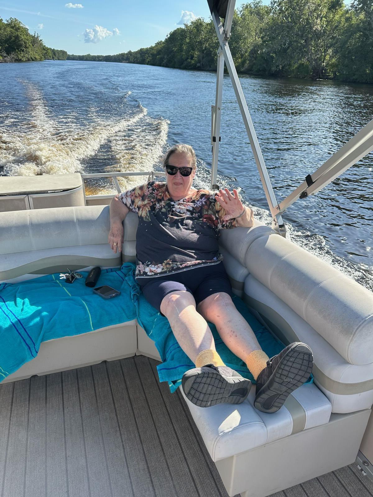 A woman sitting on a boat