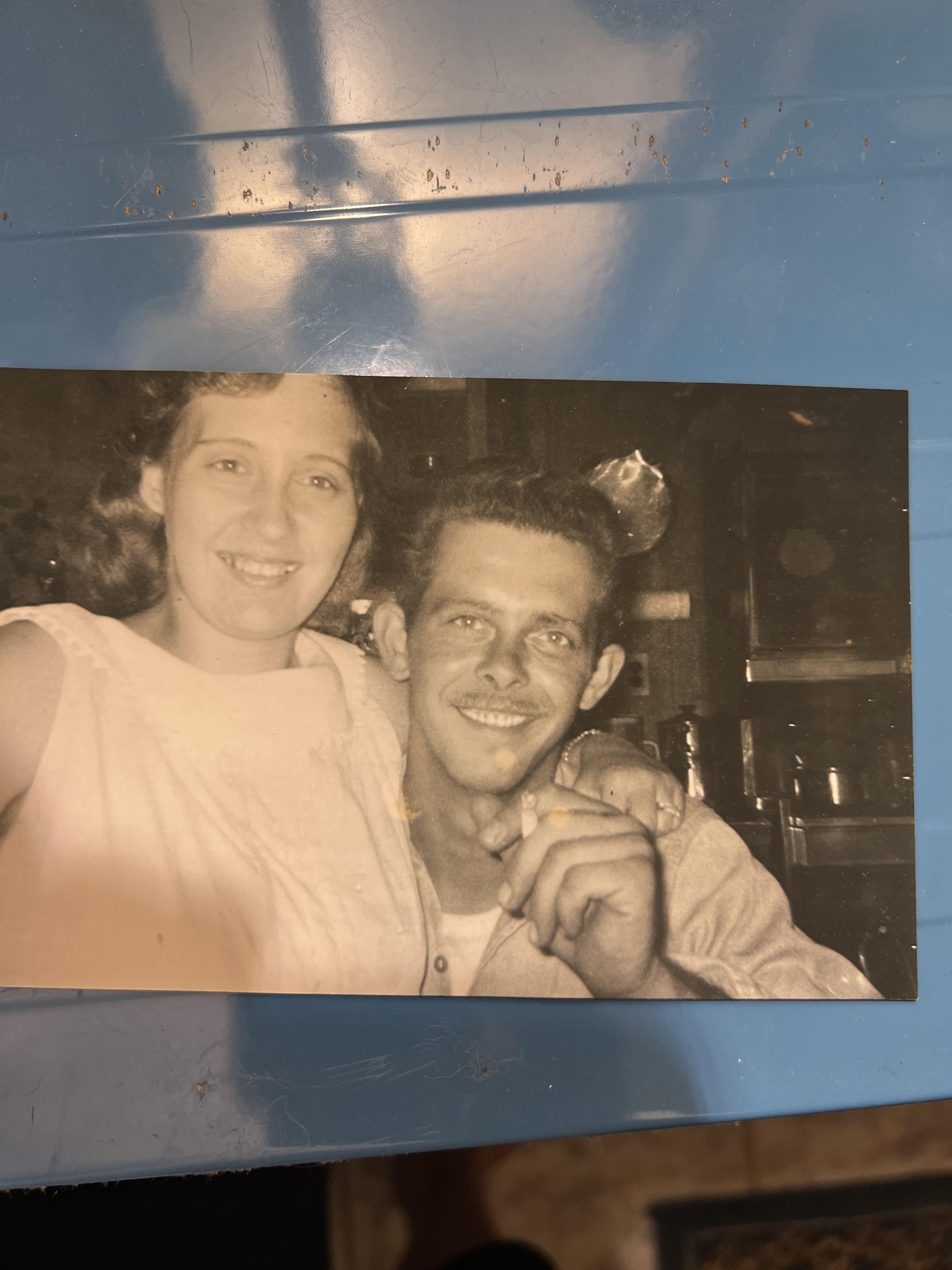 A man and woman posing for a picture