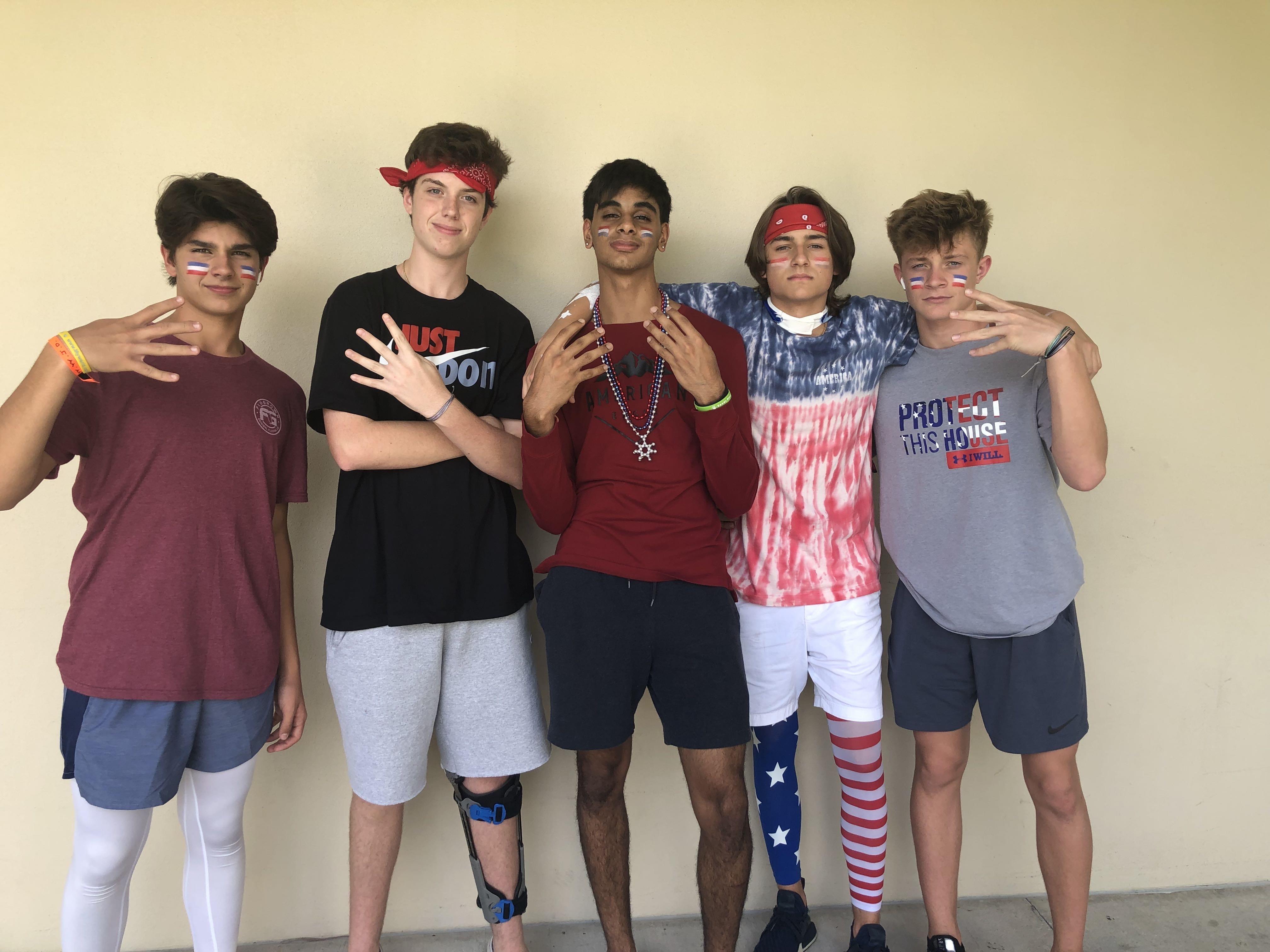 A group of boys posing for a picture