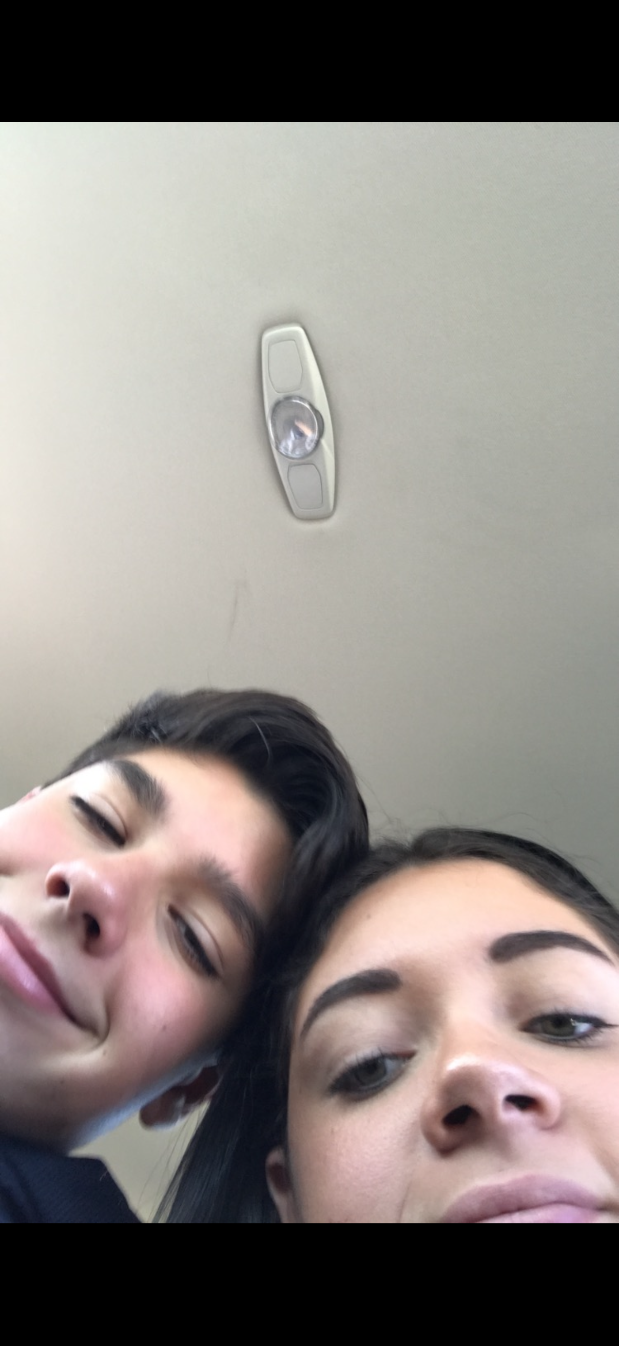 A selfie of a man and woman