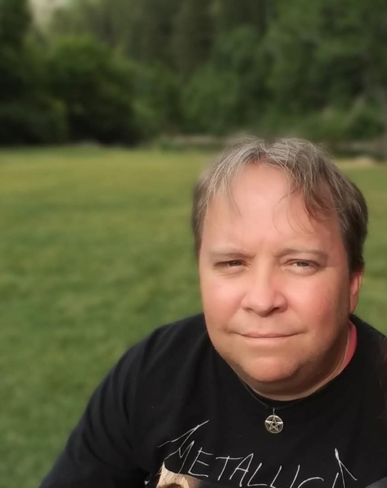 A man in a black shirt