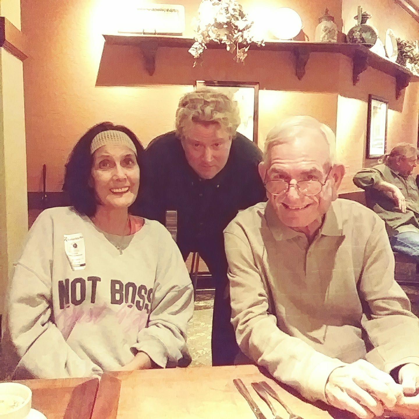 A group of people sitting at a table