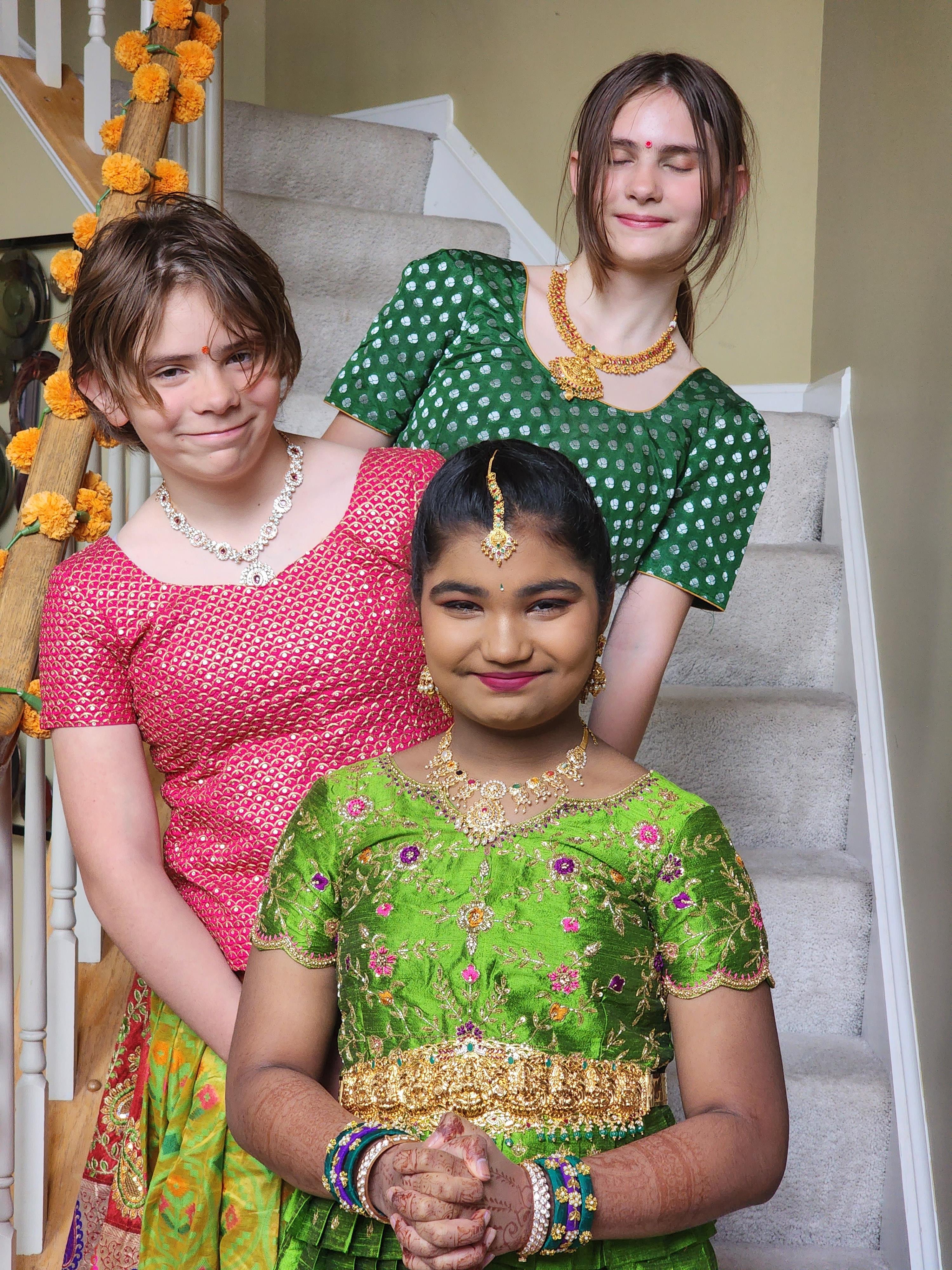 A group of kids posing for a picture