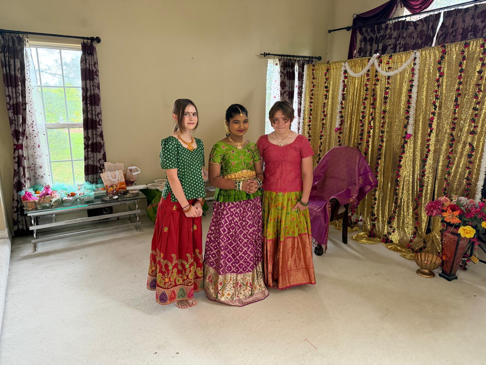 A group of women standing in a room