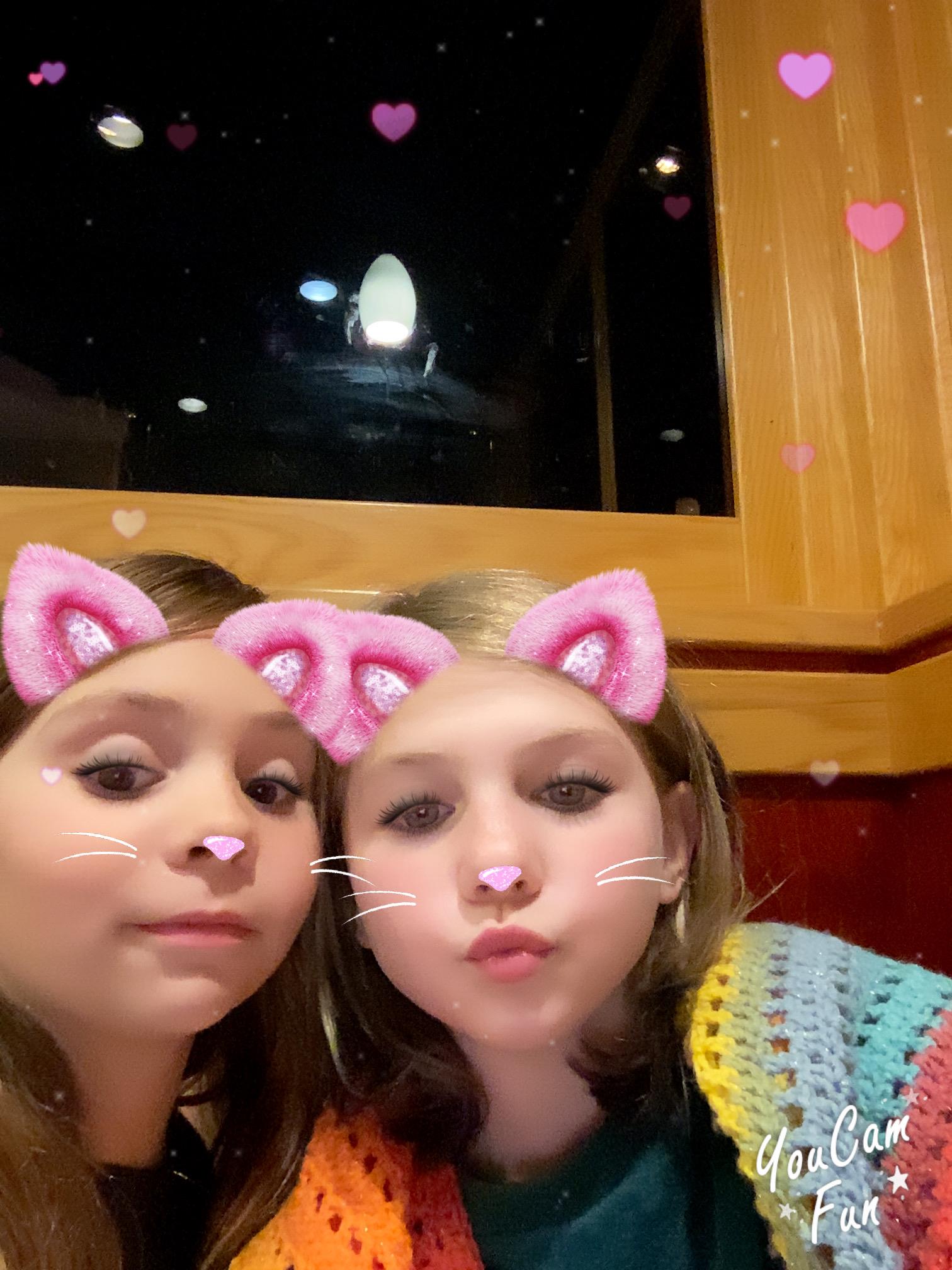 A couple of girls taking a selfie