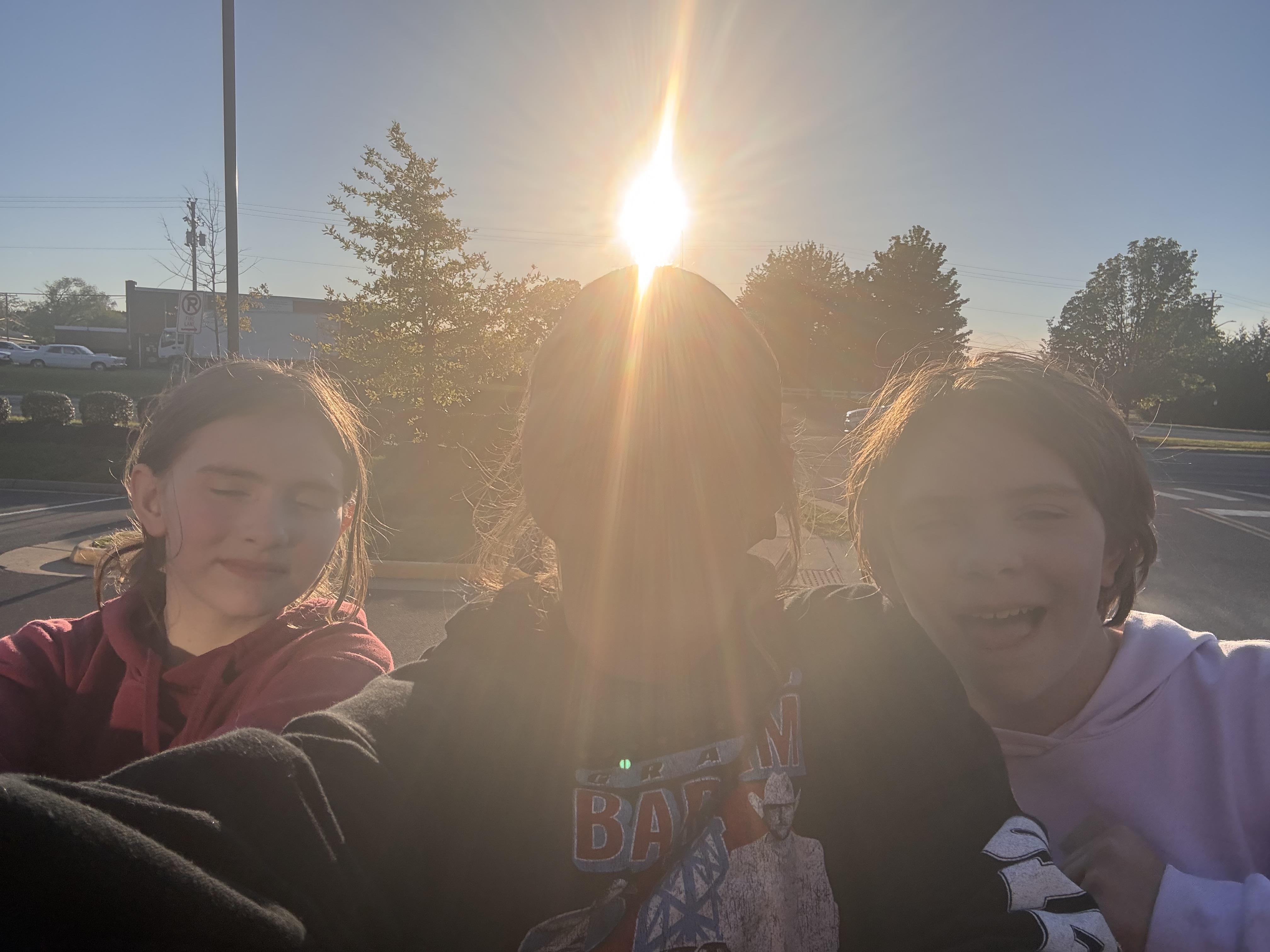 A group of people taking a selfie