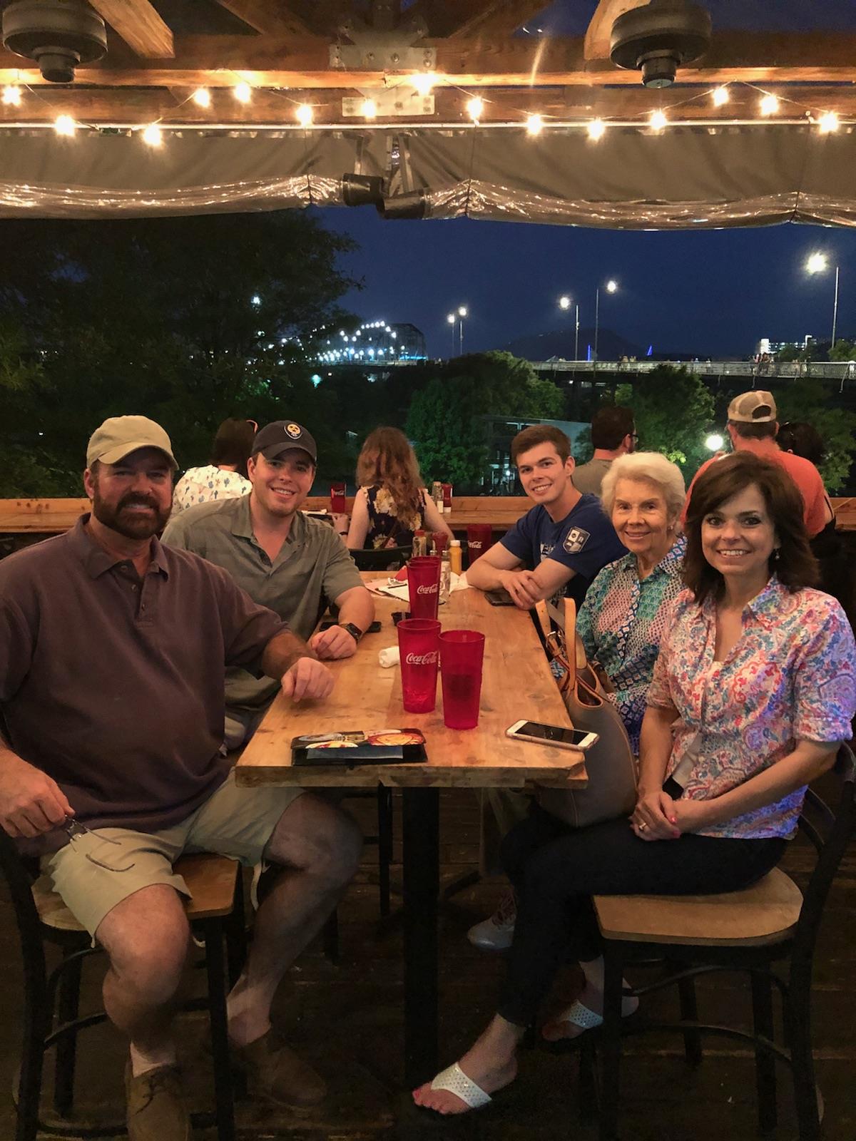 A group of people sitting at a table