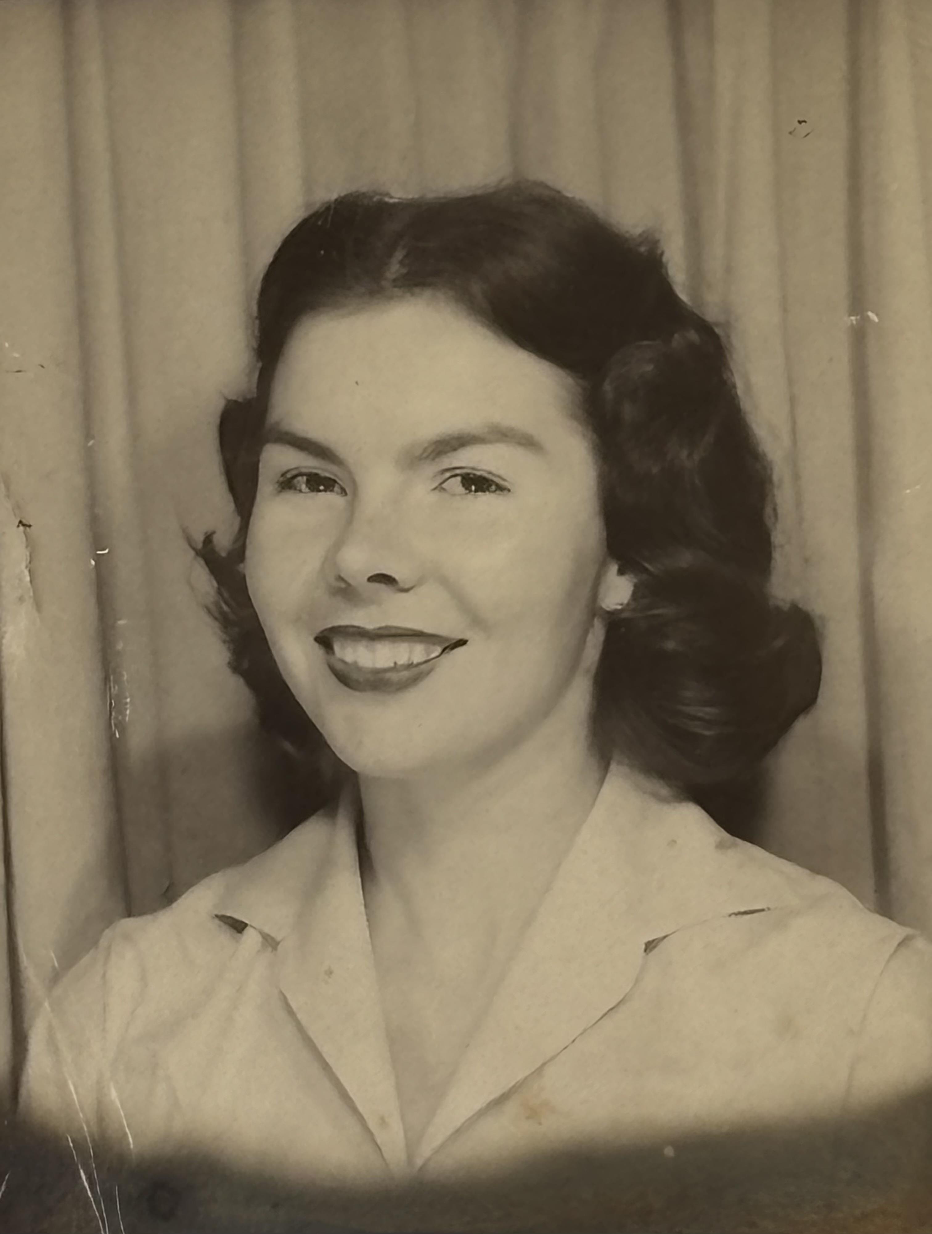 A woman smiling for a picture