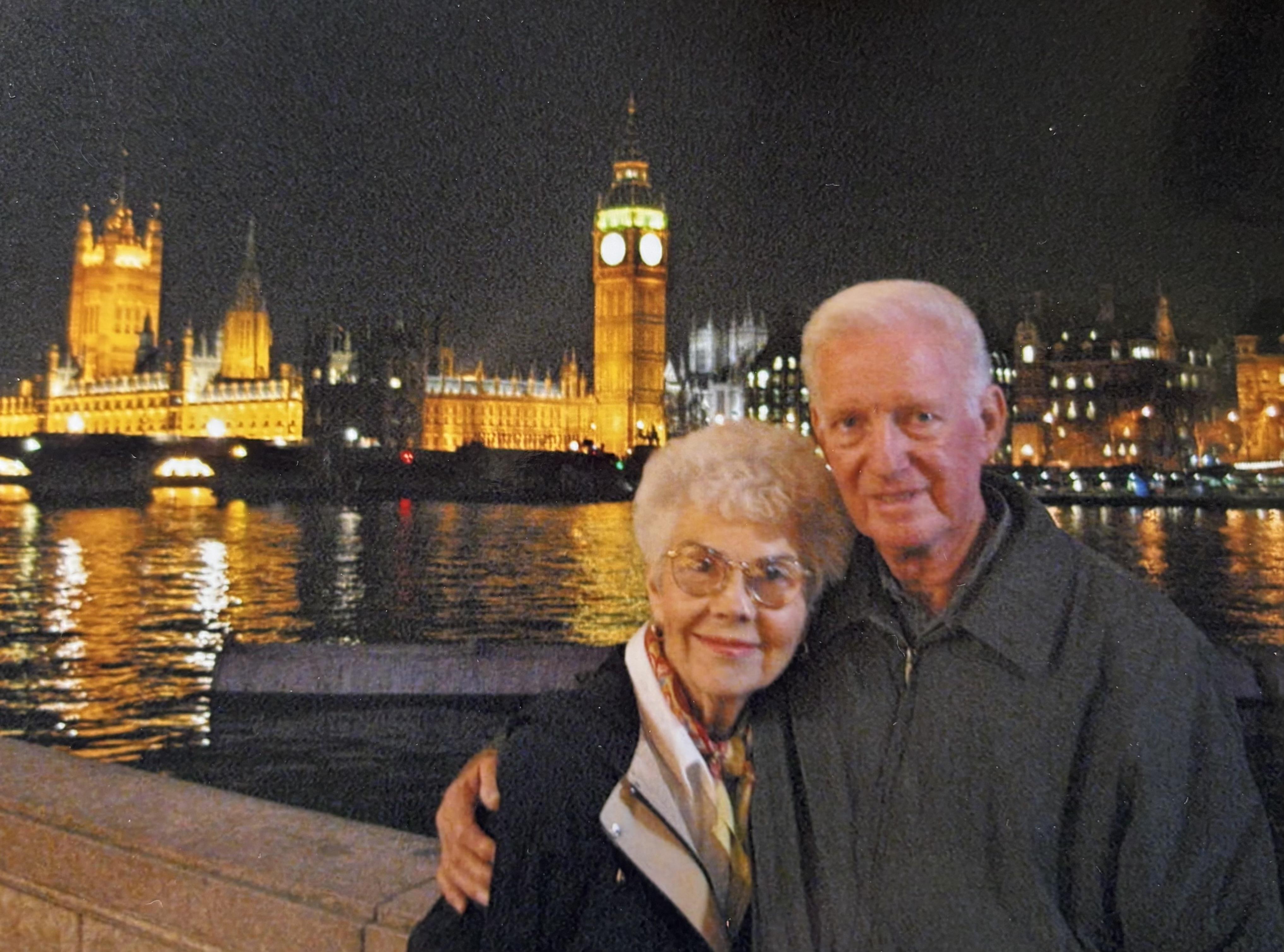 A man and woman posing for a picture