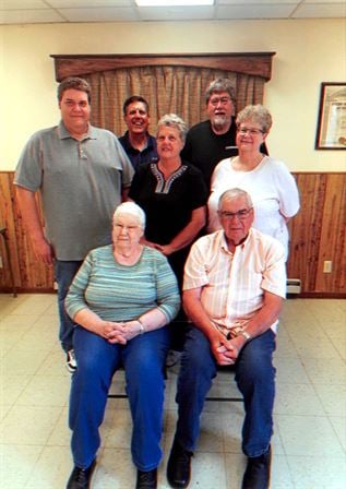 A group of people posing for a photo