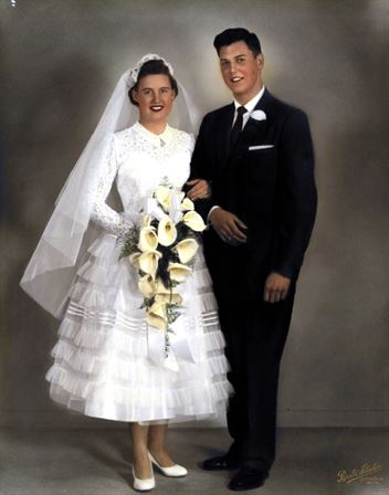 A man and woman in wedding attire