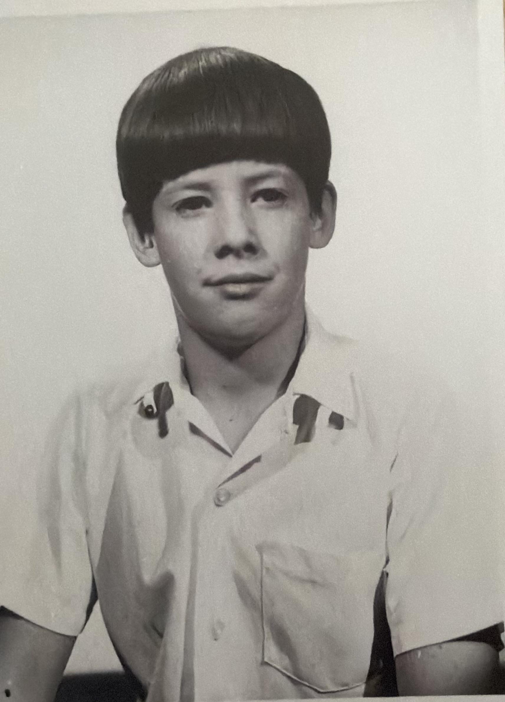 A boy with a short haircut