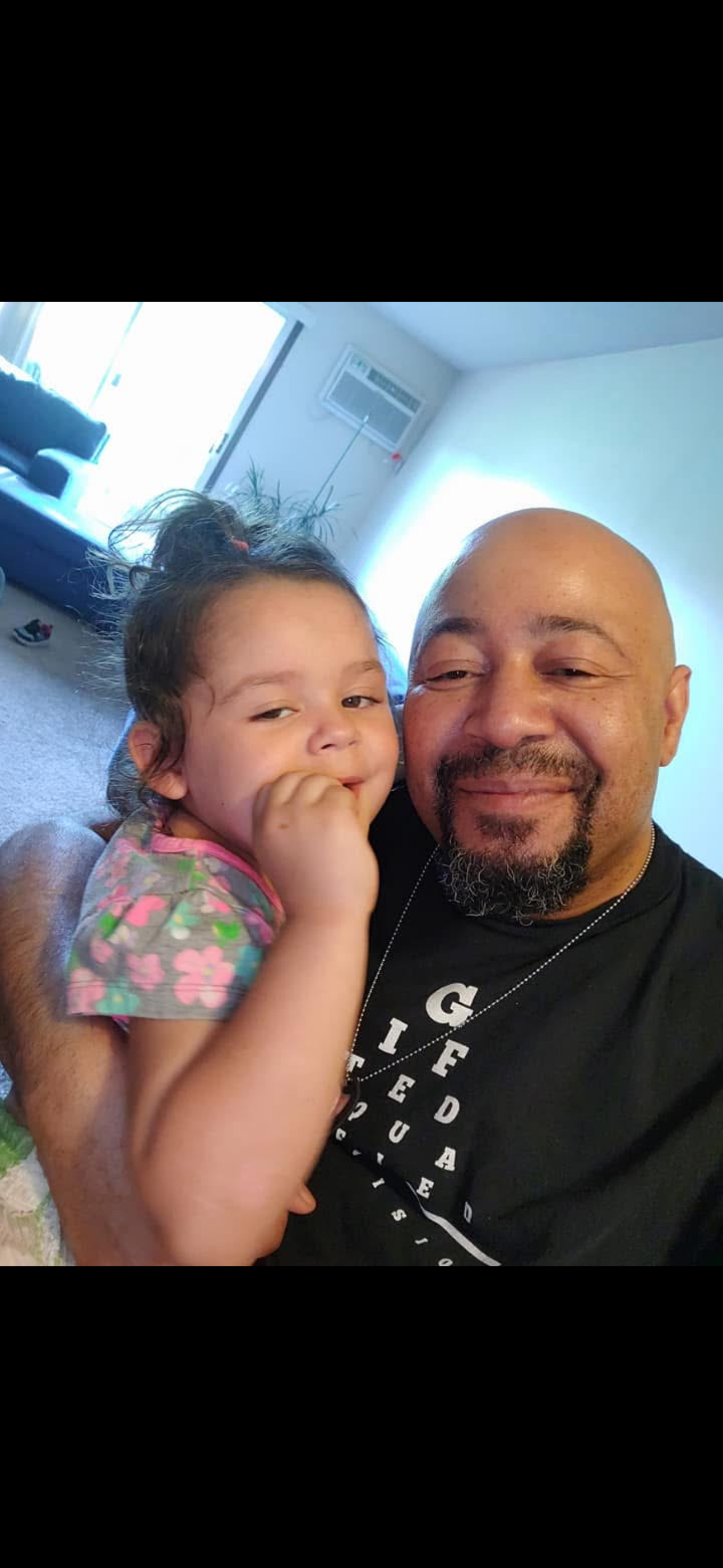 A man holding a baby