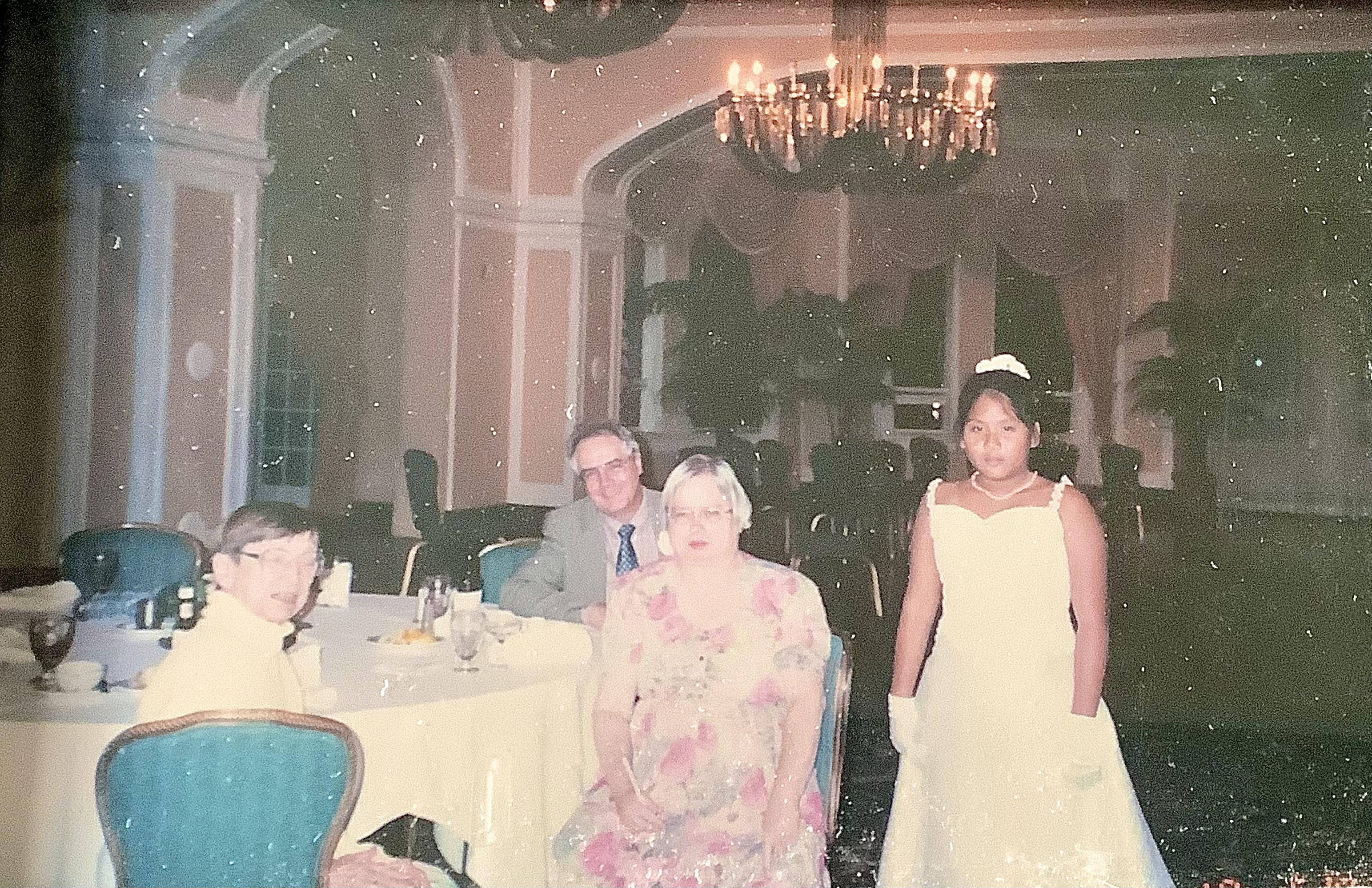 A group of people sitting at a table