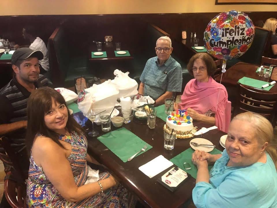 A group of people sitting at a table