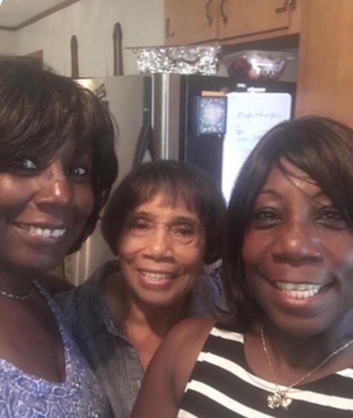 A group of women smiling for a selfie