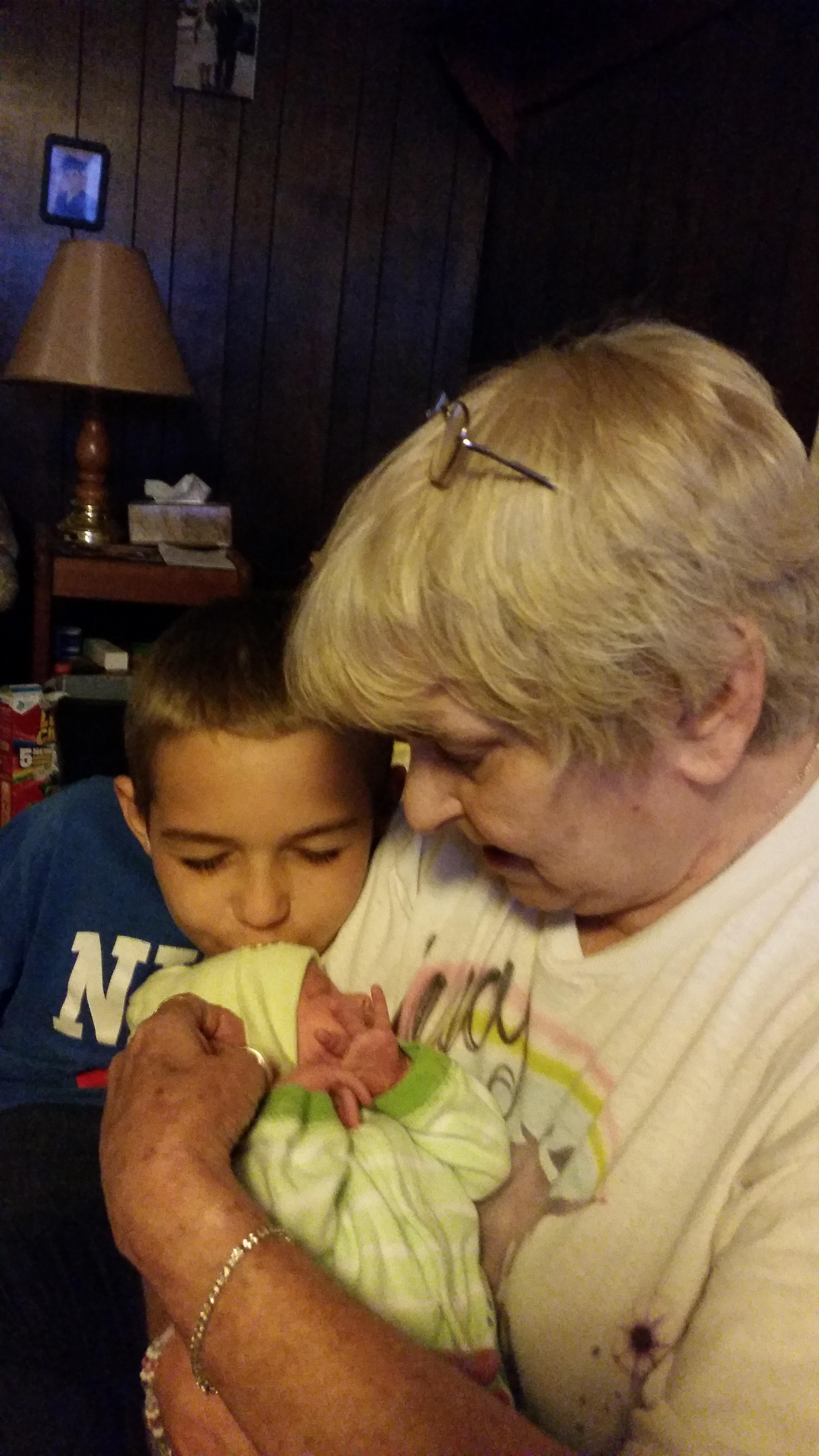 A woman holding a baby