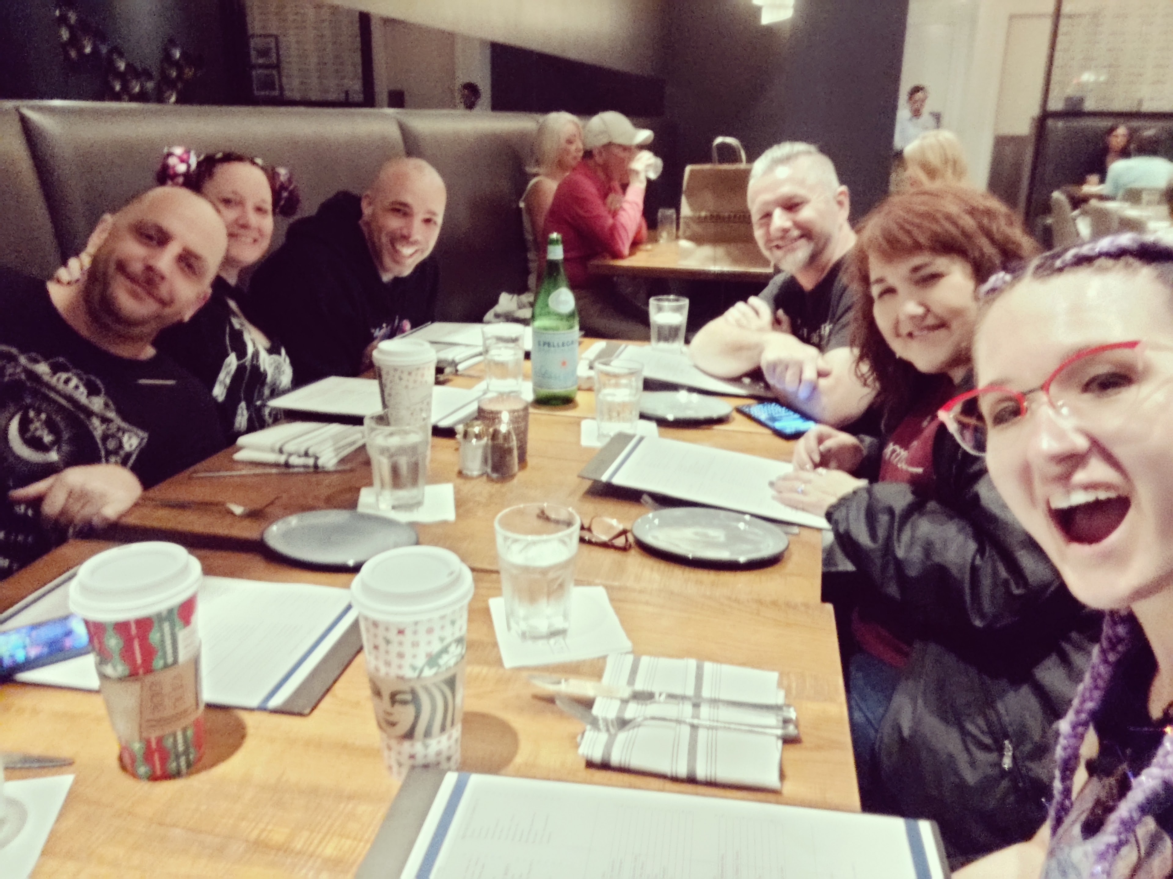 A group of people sitting at a table