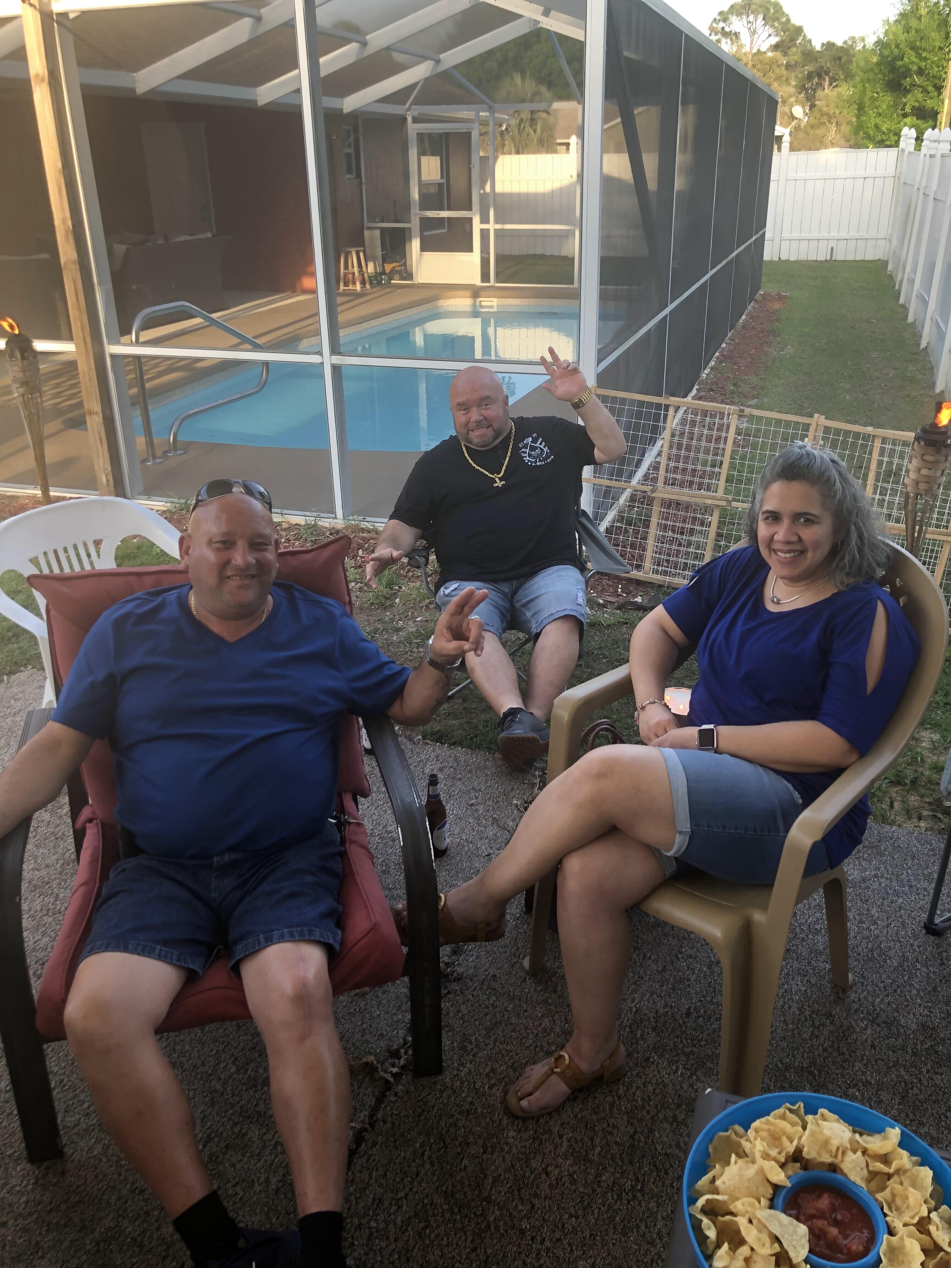 A group of people sitting in chairs