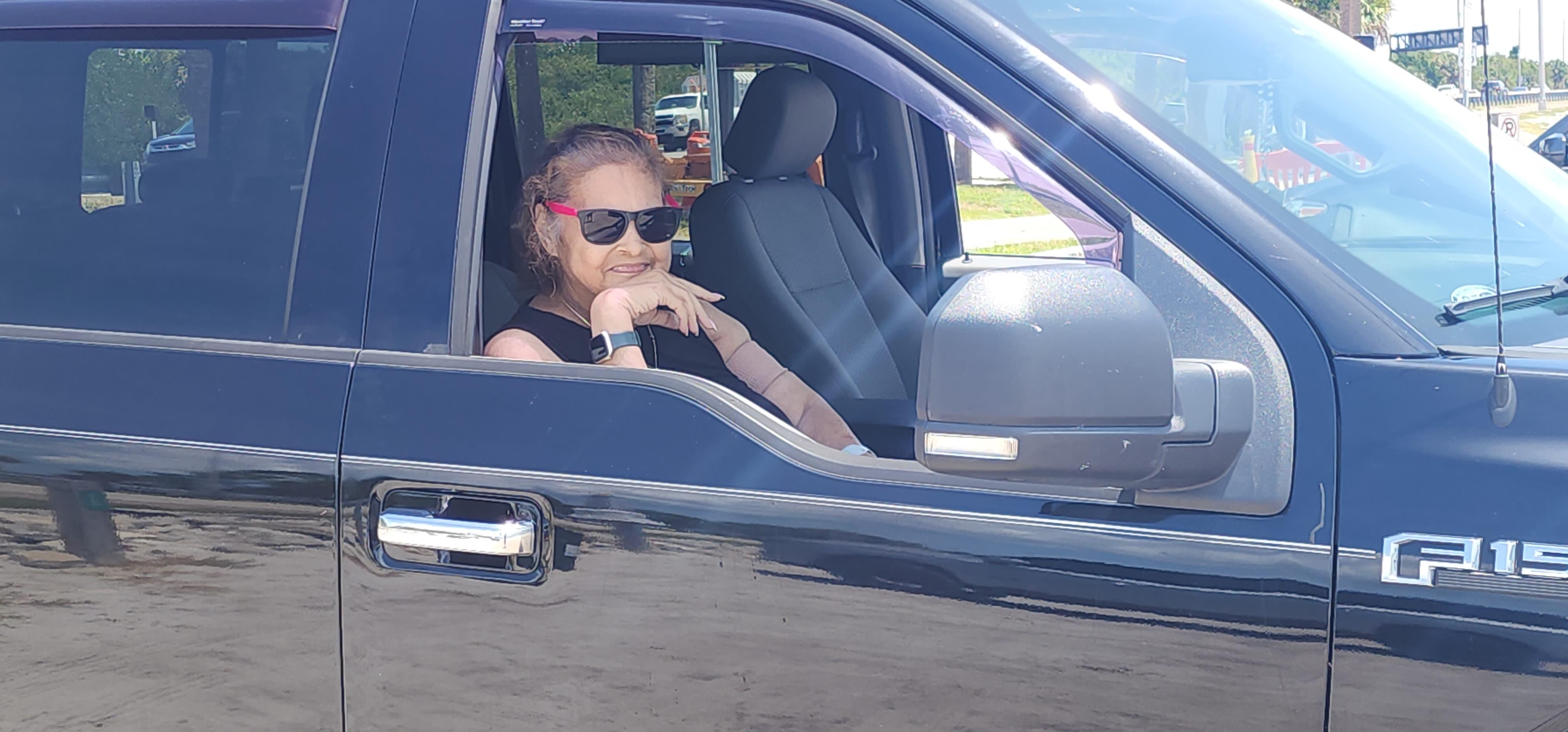 A woman in a car