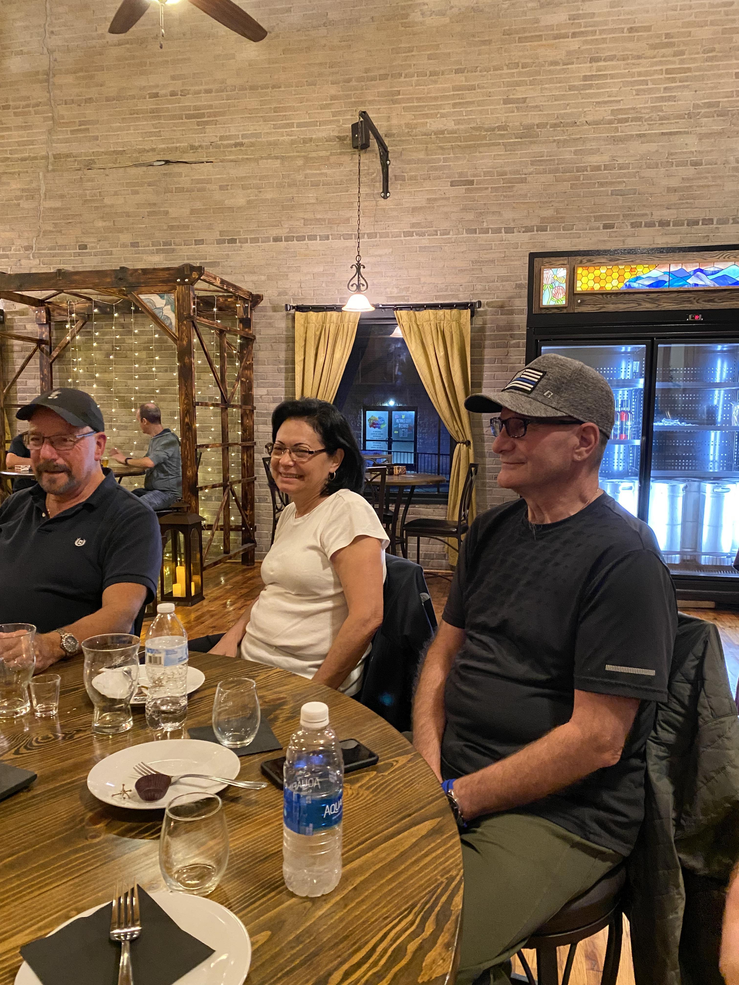 A group of people sitting at a table