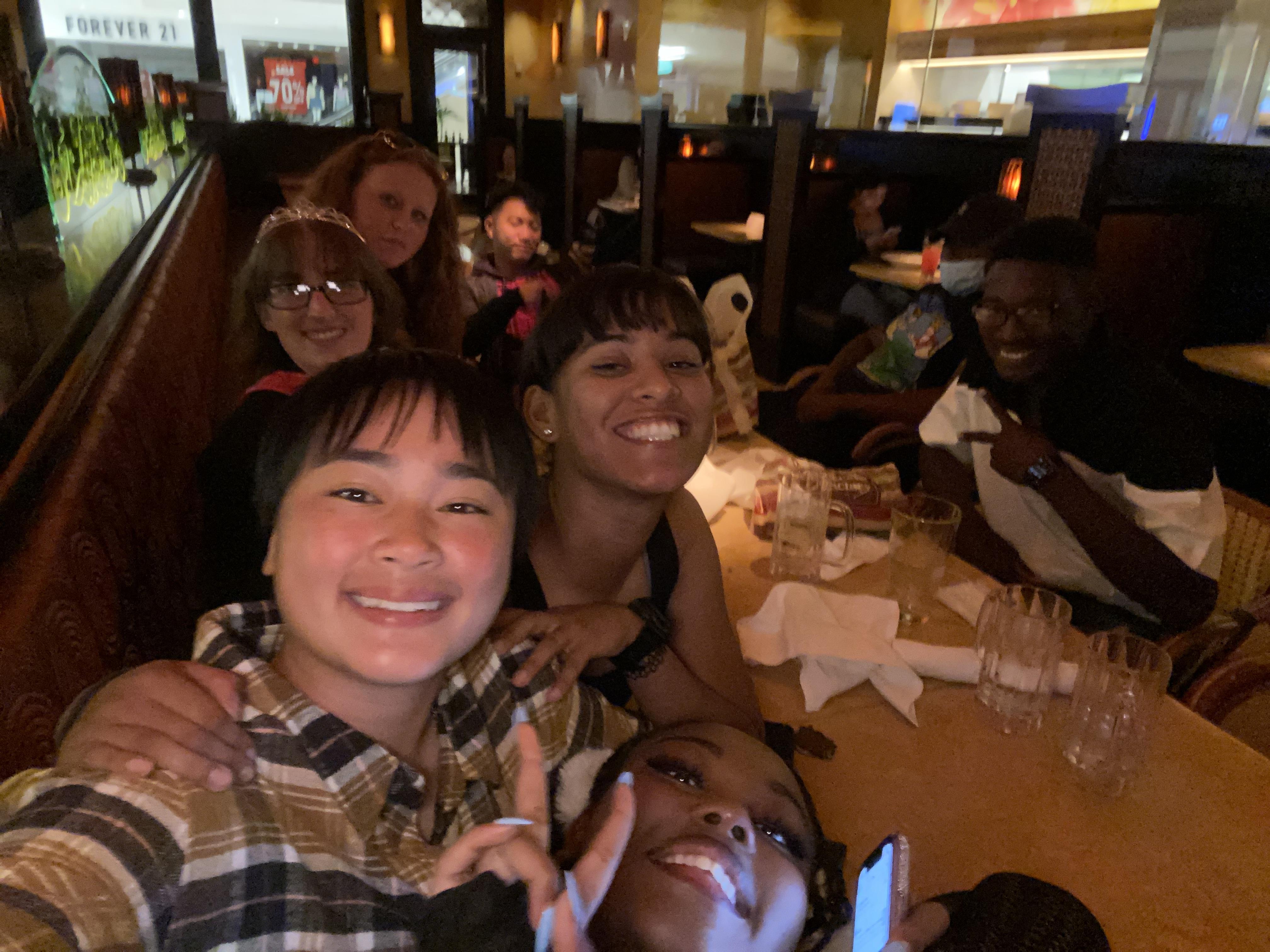 A group of people sitting at a table