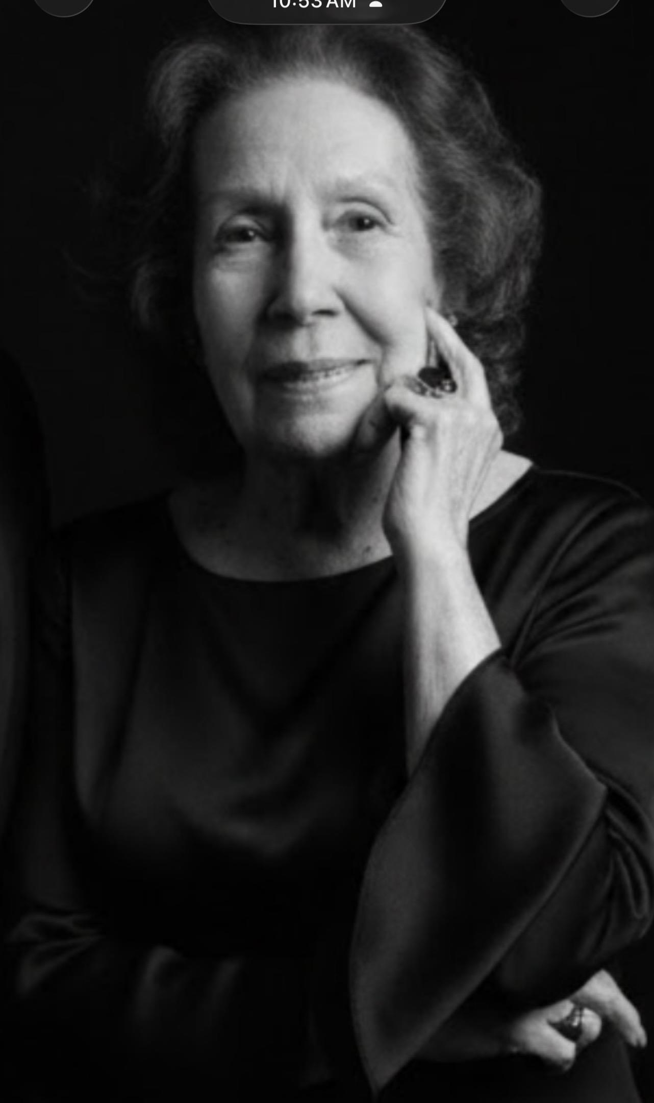 A woman in a black dress