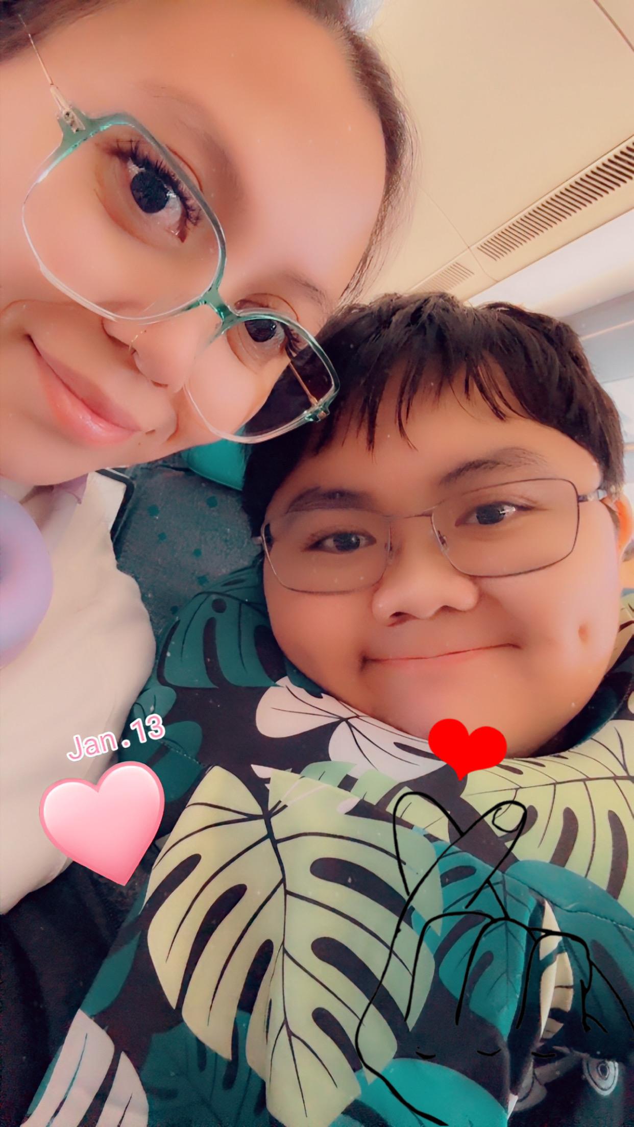 A selfie of a boy and girl