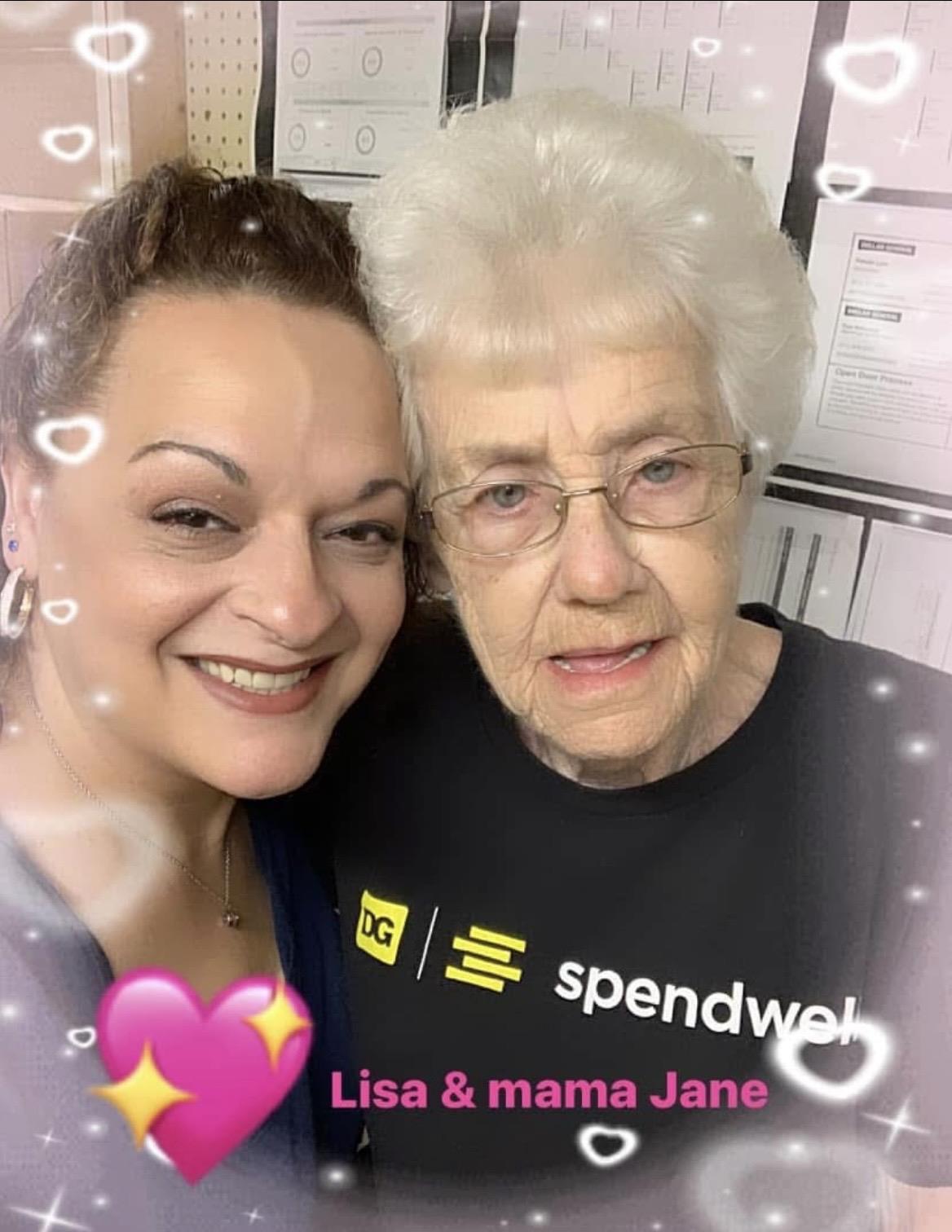 A woman and a woman posing for a selfie